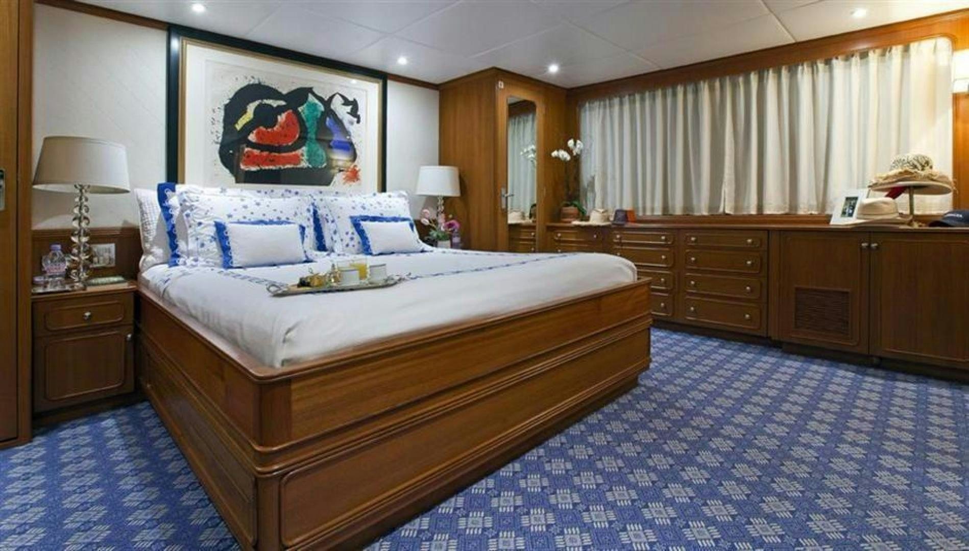 a large bedroom with a large bed aboard AUDACIA Yacht for Sale