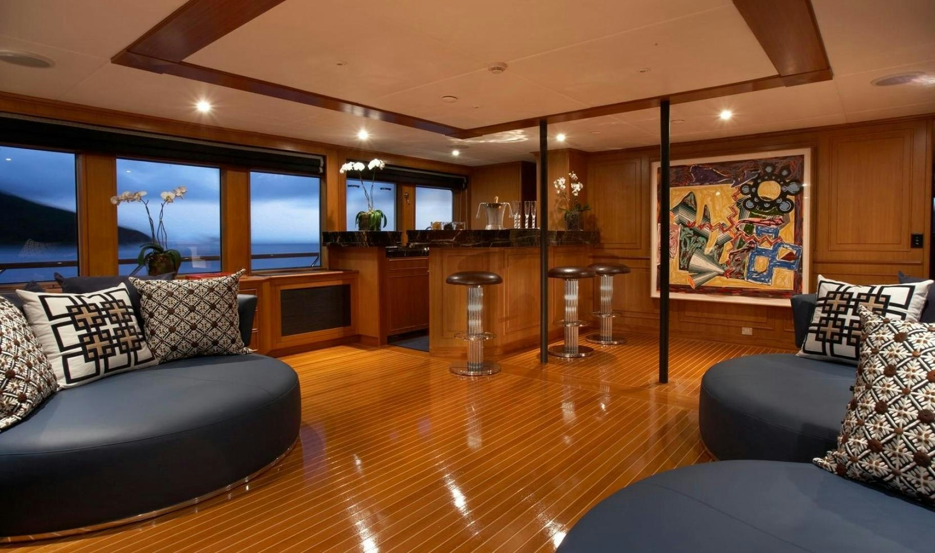 a living room with a large window aboard AUDACIA Yacht for Sale