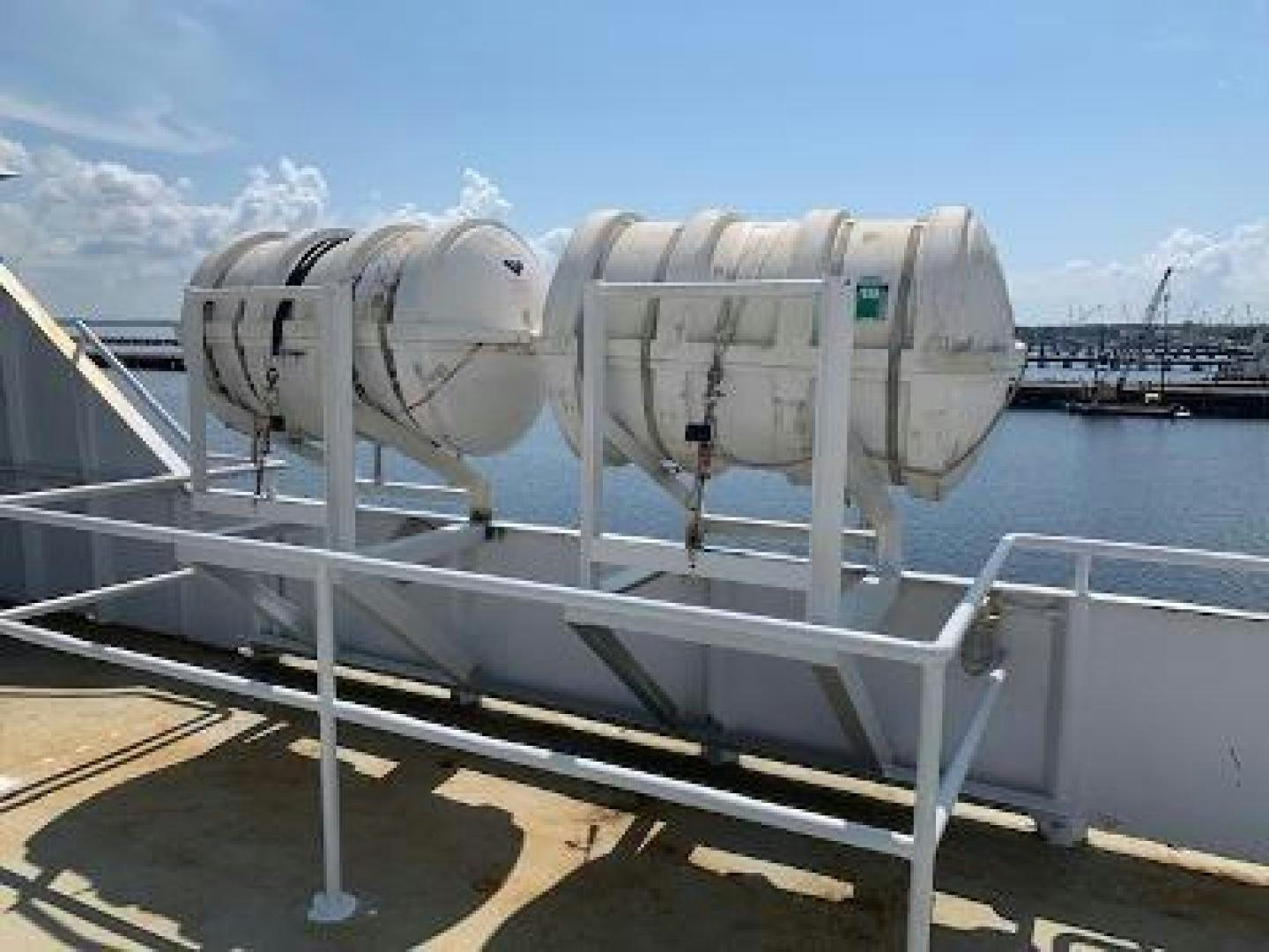 a large metal object on a railing aboard No Name Yacht for Sale