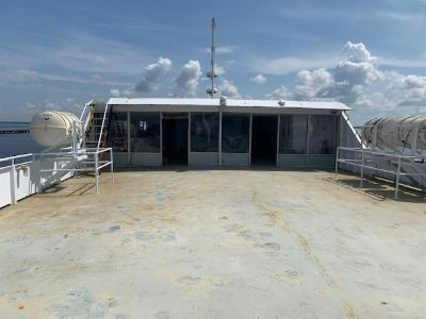 a building with a glass roof aboard No Name Yacht for Sale