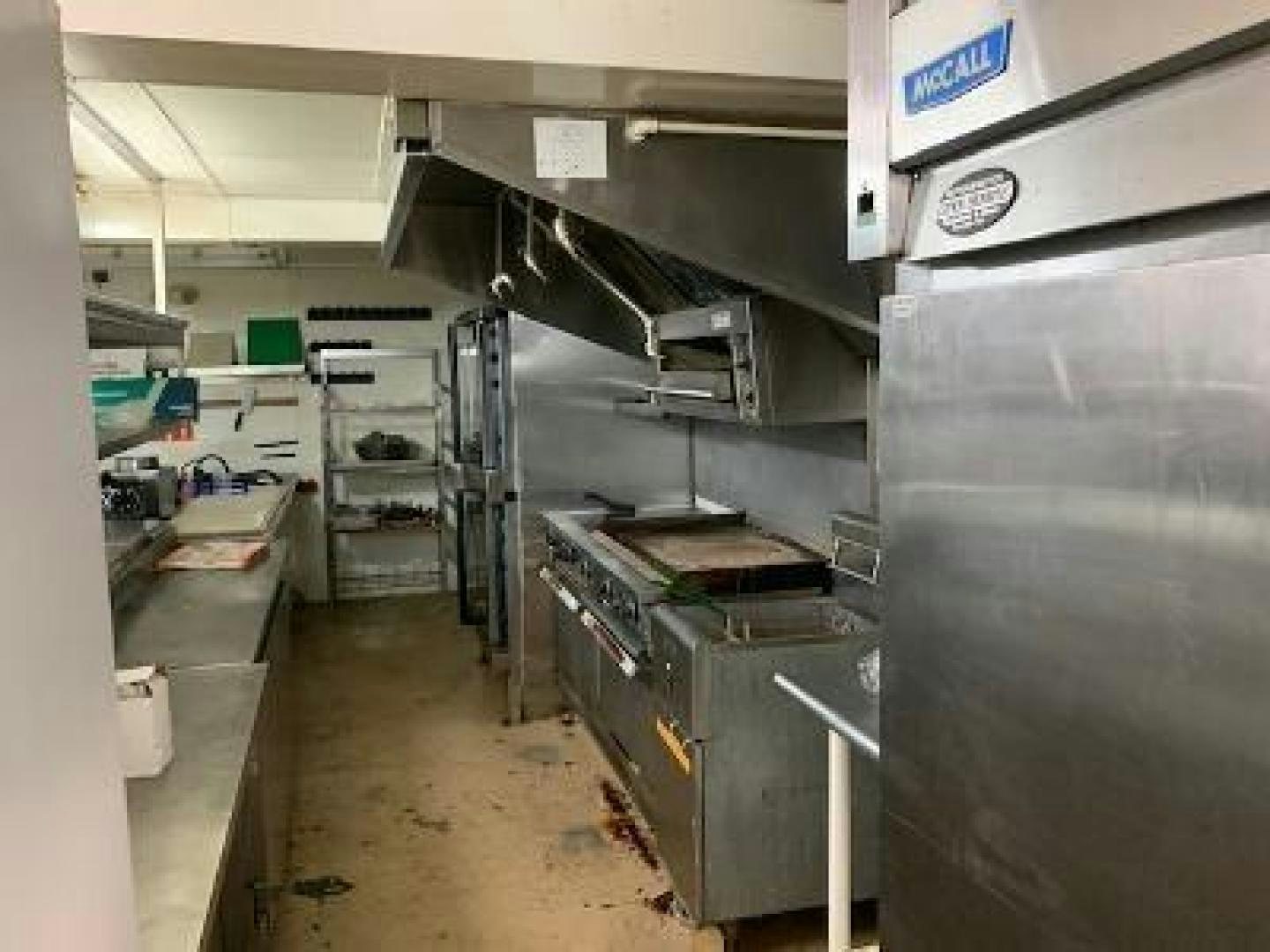 a large industrial kitchen aboard No Name Yacht for Sale