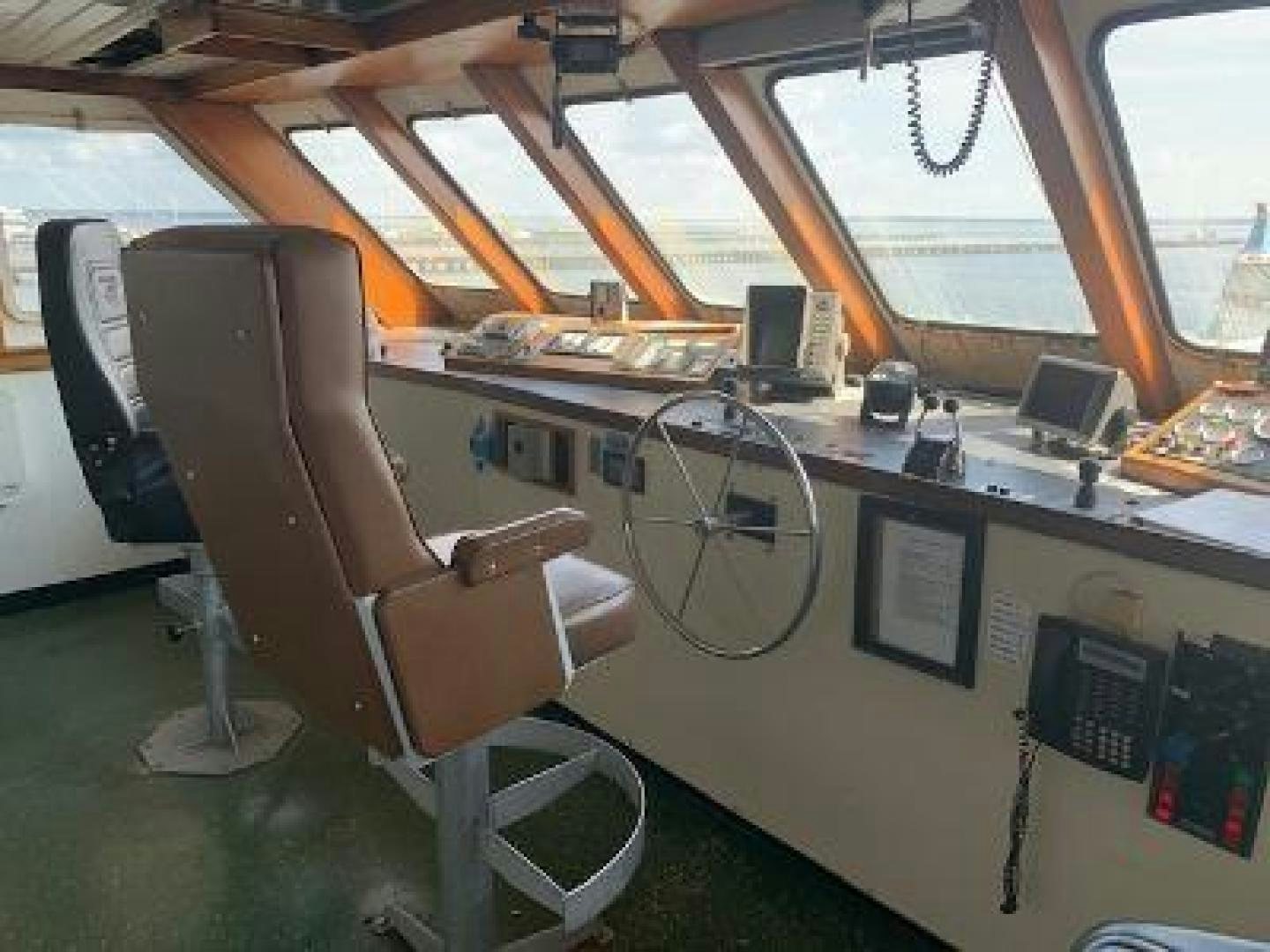 a room with a desk and computer aboard No Name Yacht for Sale