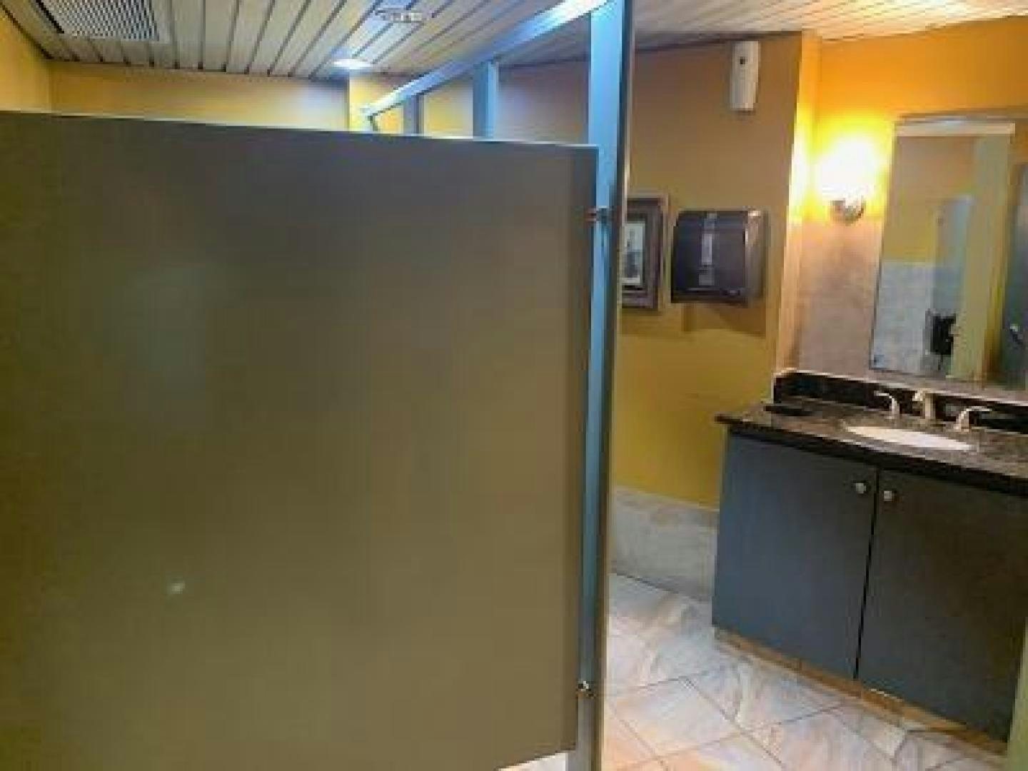 a bathroom with a large wall aboard No Name Yacht for Sale