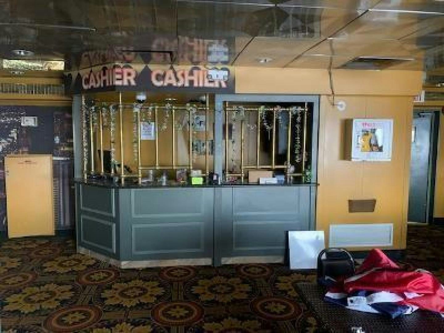 a storefront with a sign aboard No Name Yacht for Sale