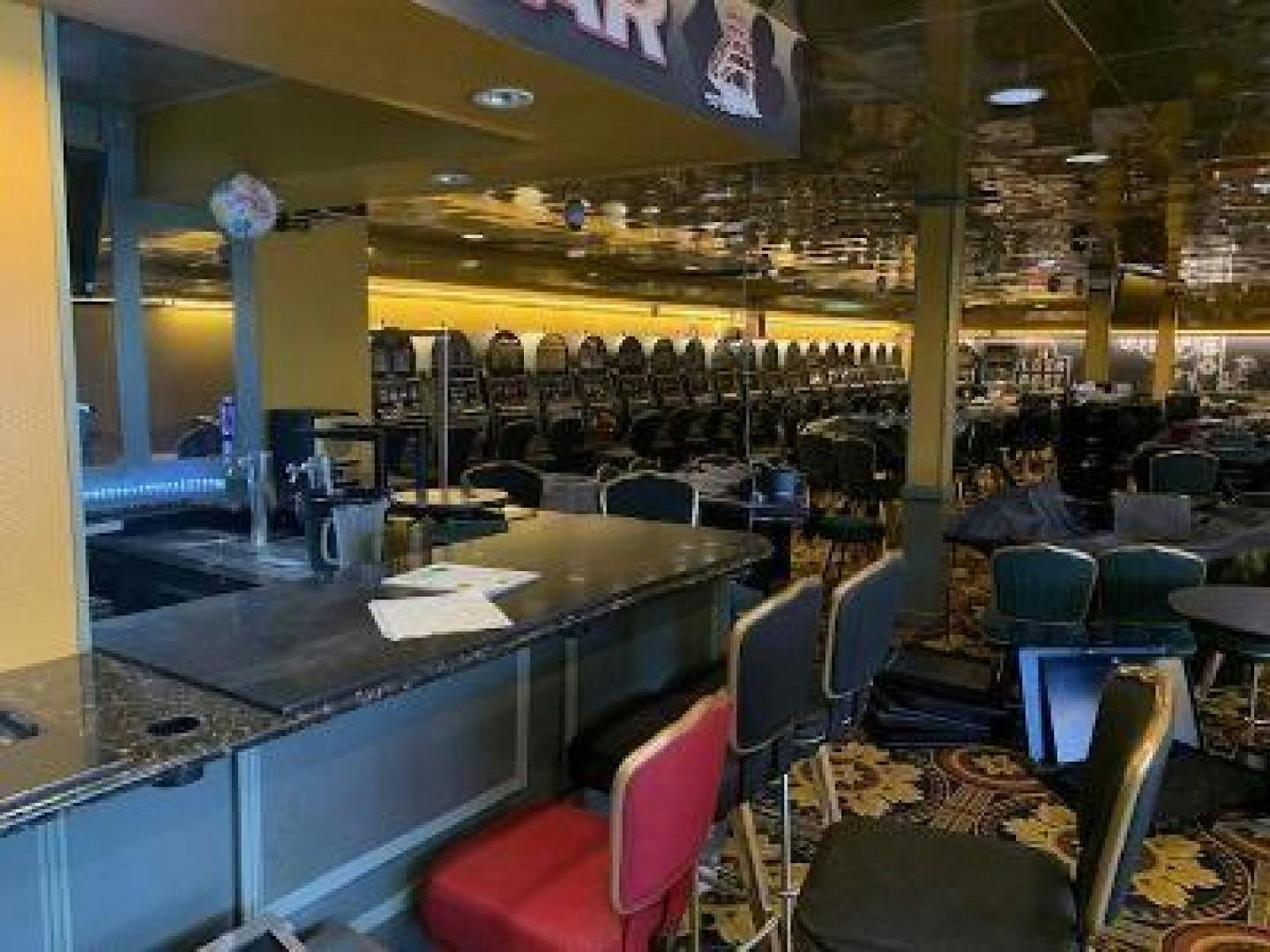 a restaurant with tables and chairs aboard No Name Yacht for Sale