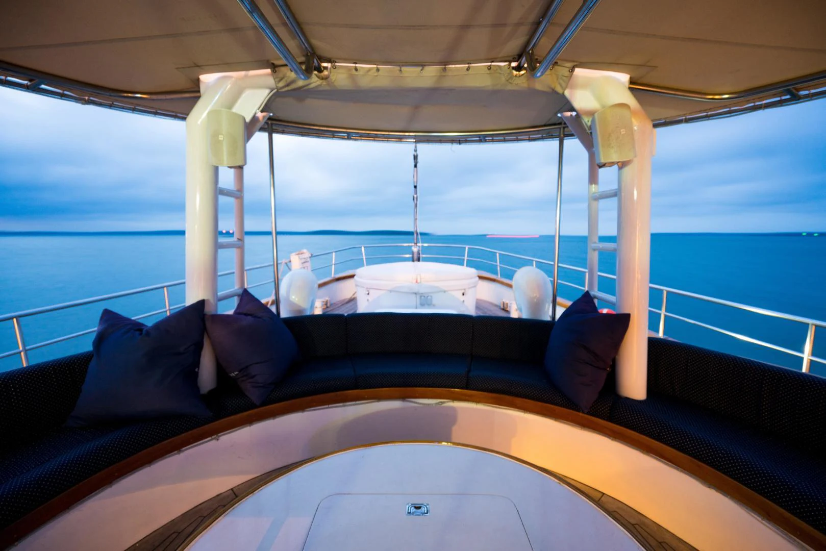 a boat with a person sitting on the deck aboard ARABELLA Yacht for Sale