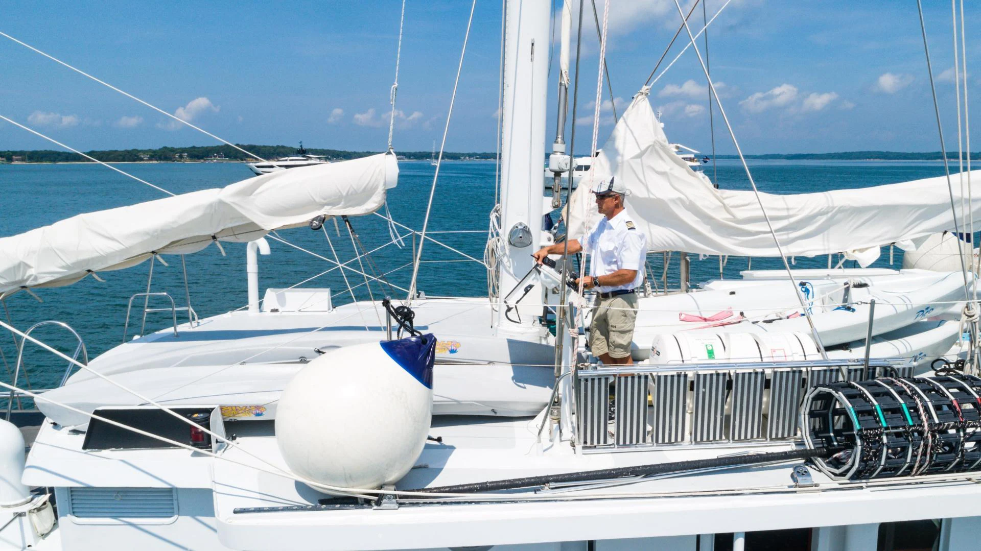 a person standing on a boat aboard ARABELLA Yacht for Sale
