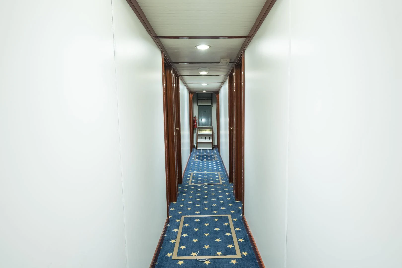 a hallway with blue tile aboard ARABELLA Yacht for Sale