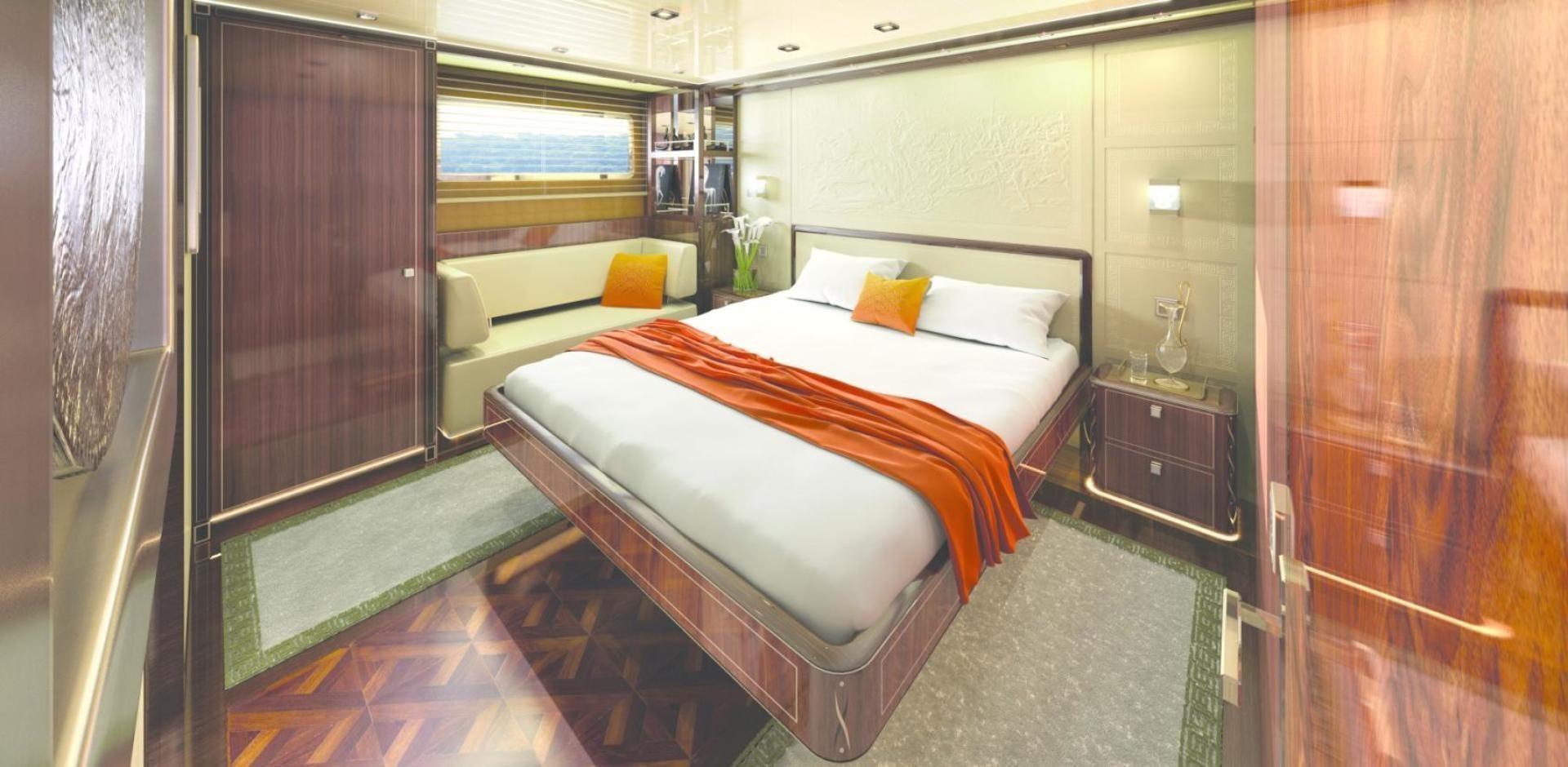 a room with a bed and a window aboard TROY Yacht for Sale