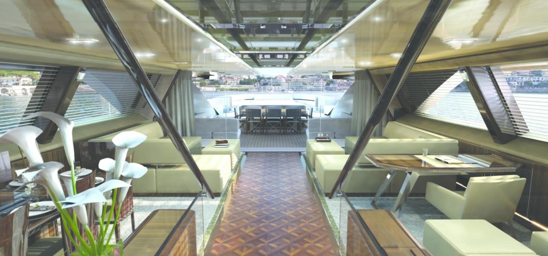 a room with a table and chairs aboard TROY Yacht for Sale