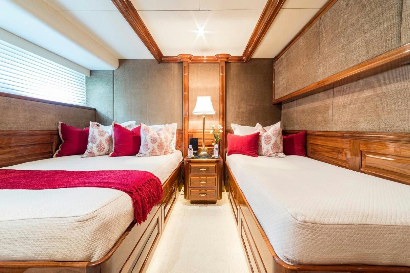 a couple of beds in a hotel room aboard POPEYE Yacht for Sale