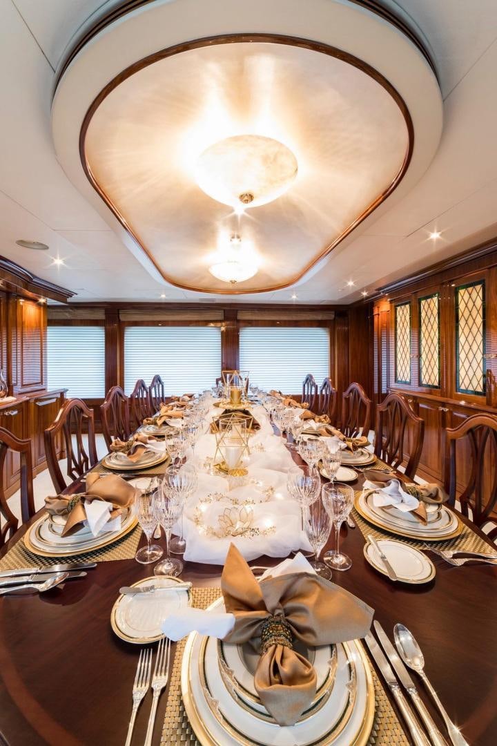 a large dining room table aboard POPEYE Yacht for Sale