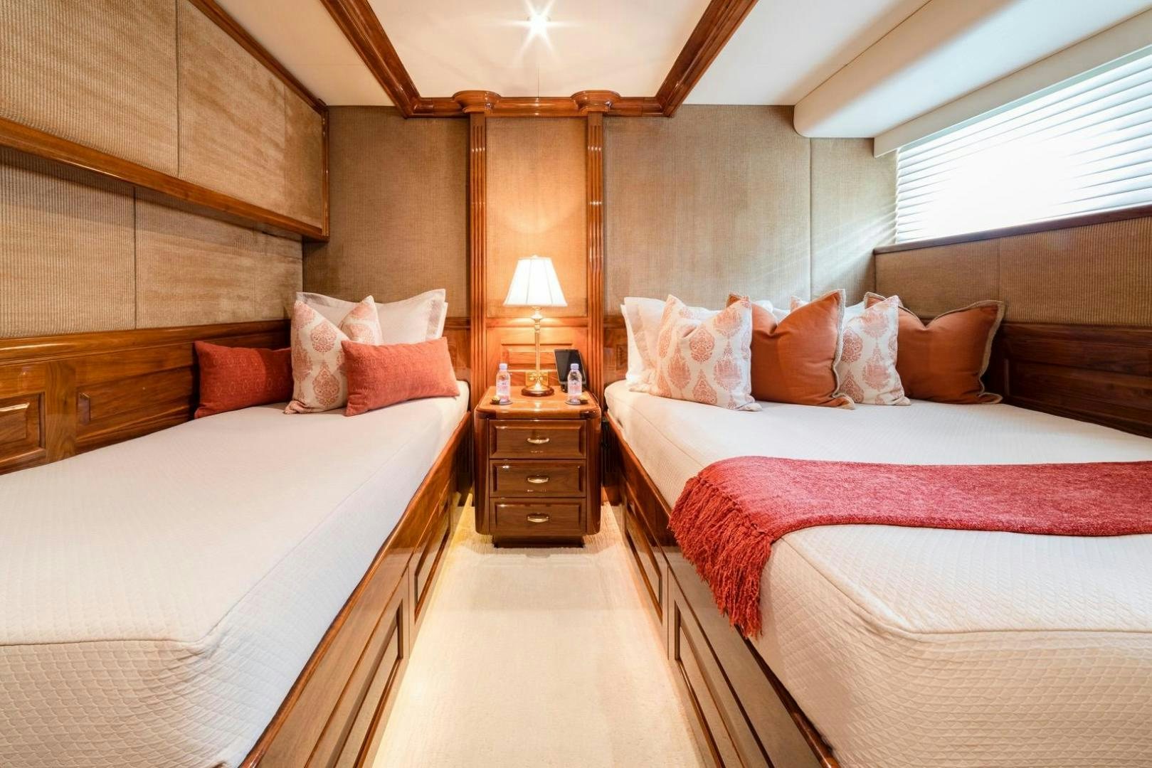 a couple of beds in a hotel room aboard POPEYE Yacht for Sale