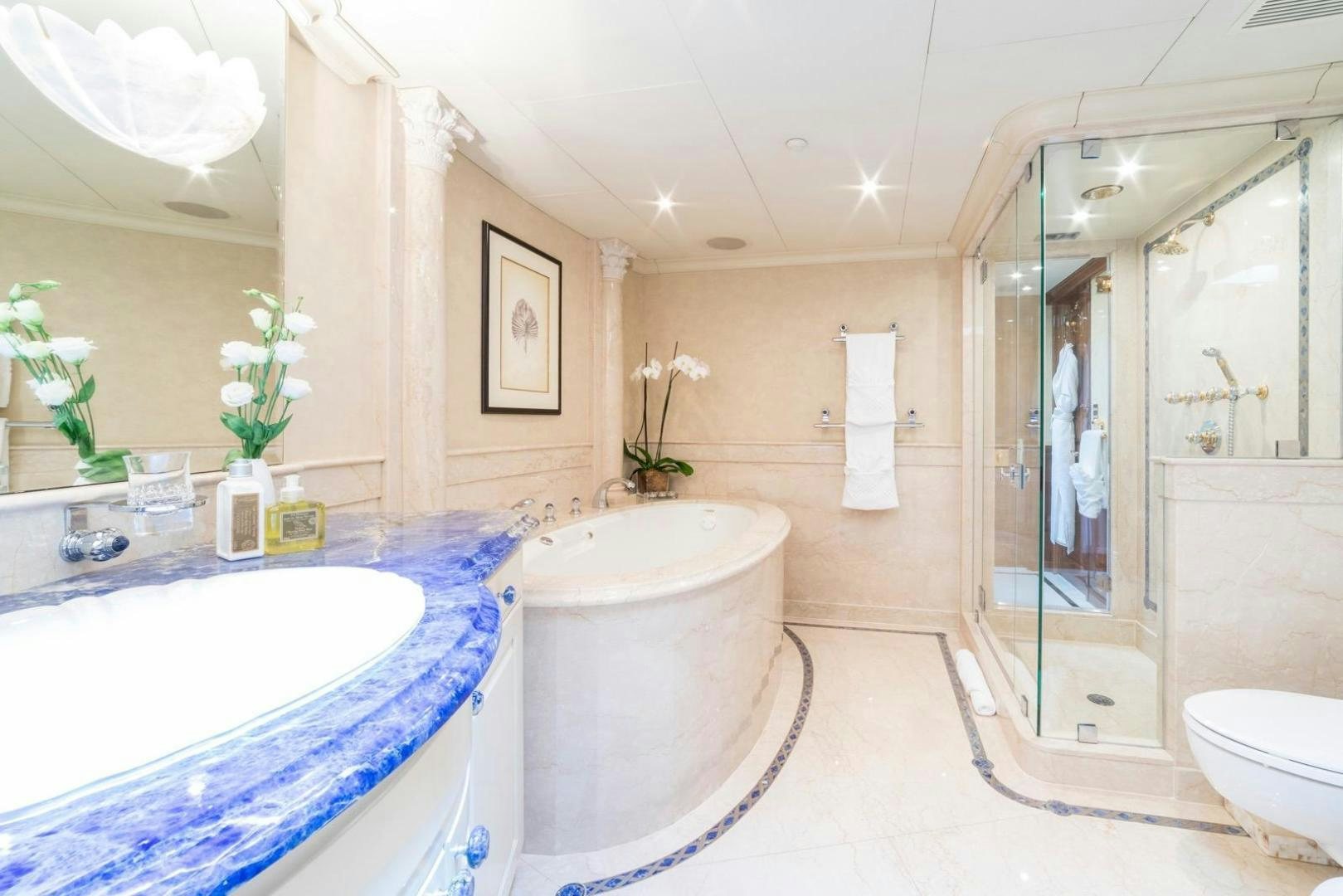 a bathroom with a tub sink and a shower aboard POPEYE Yacht for Sale