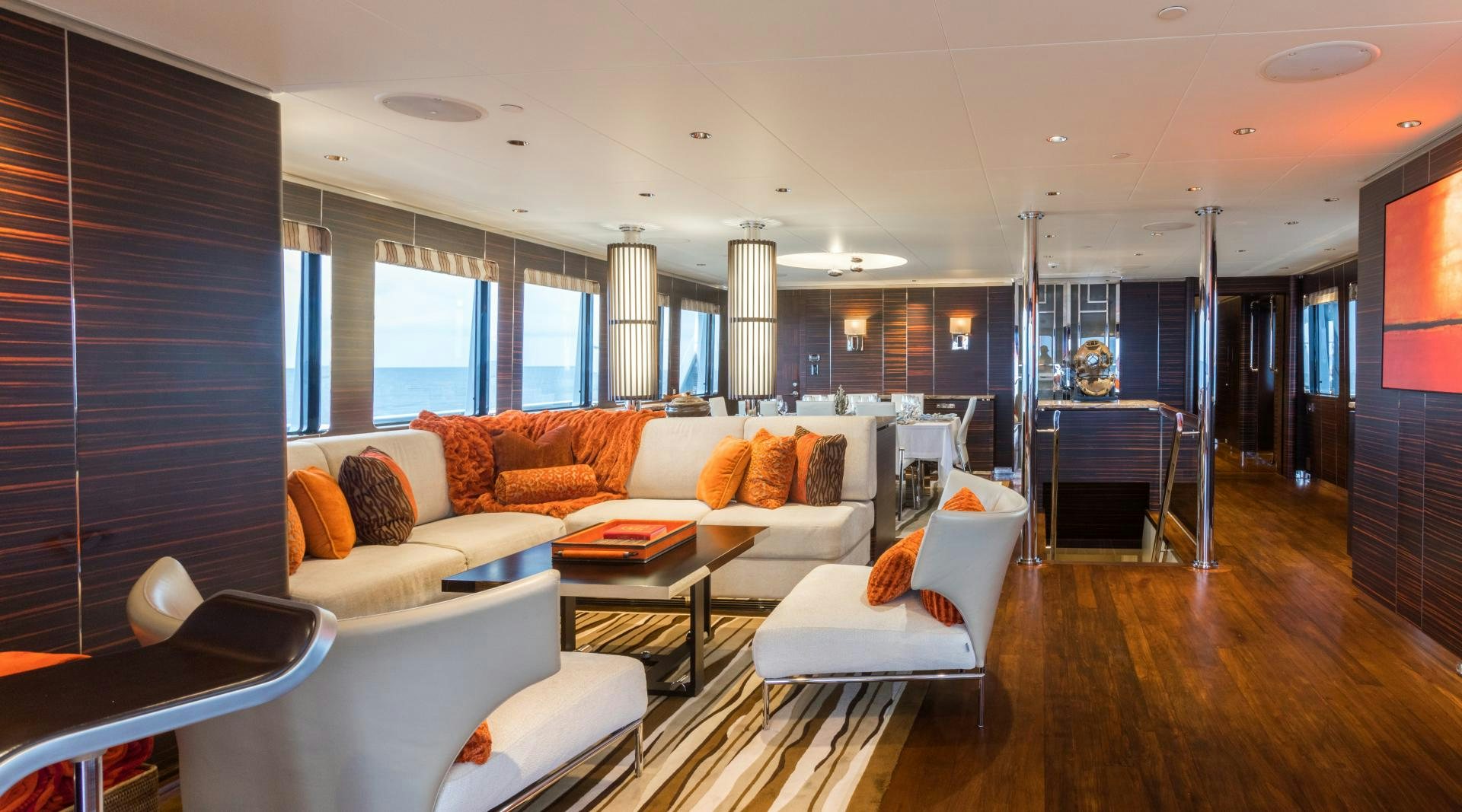 a living room with a large window aboard QING Yacht for Sale