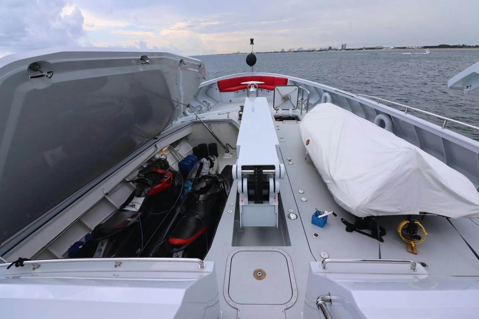 a boat with a motor aboard QING Yacht for Sale