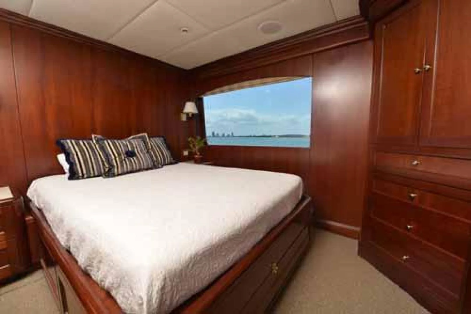 a bed in a cabin aboard UTOPIA III Yacht for Sale