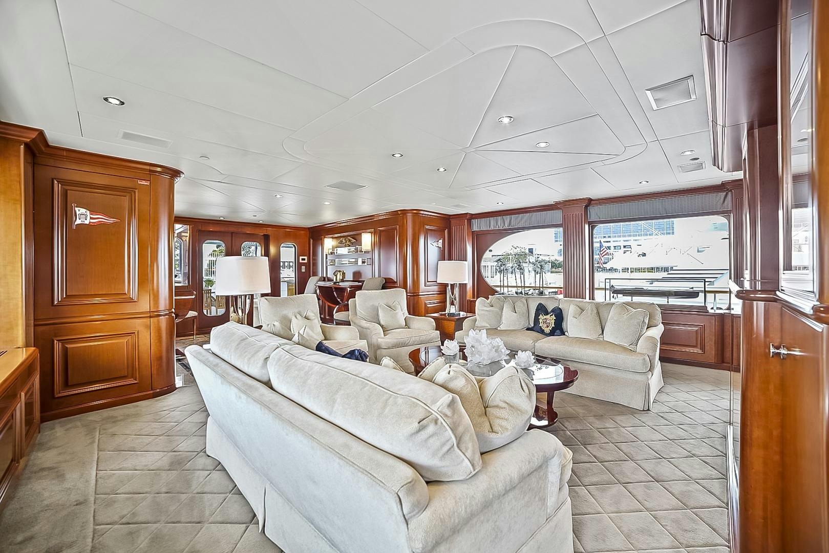 a living room with couches and a table aboard ARTEMIS Yacht for Sale