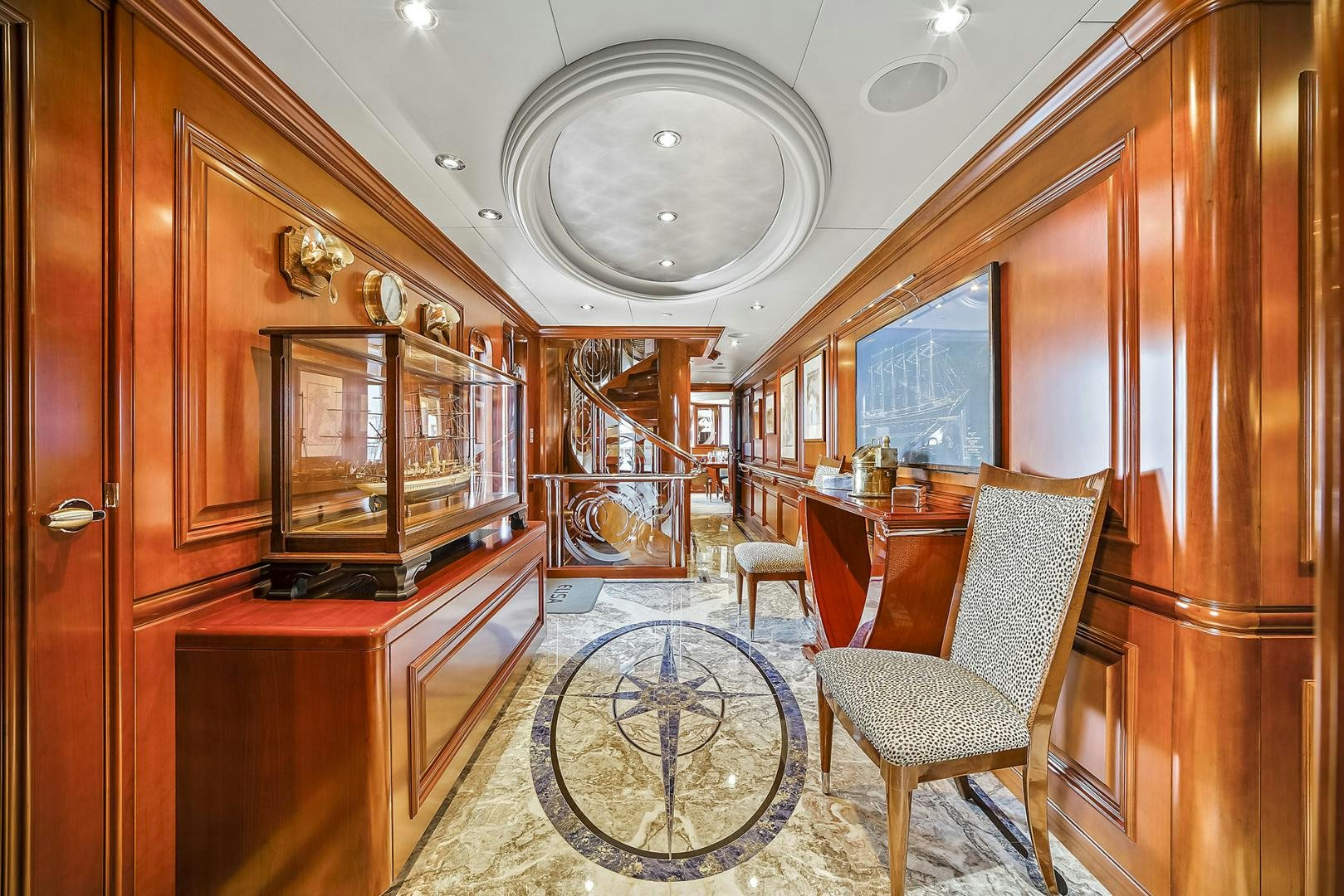 a room with a chair and a table aboard ARTEMIS Yacht for Sale