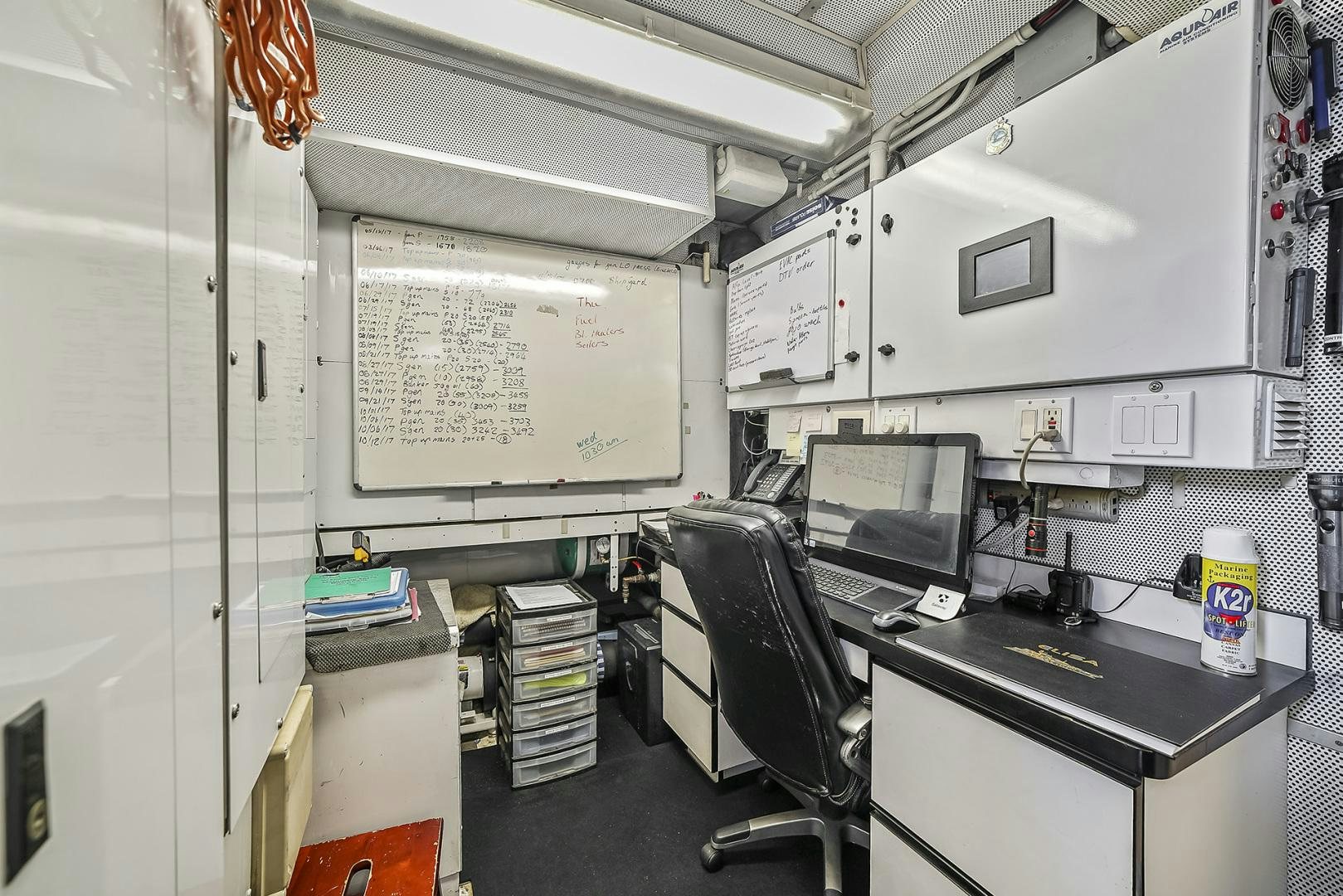 a room with a desk and computer aboard ARTEMIS Yacht for Sale