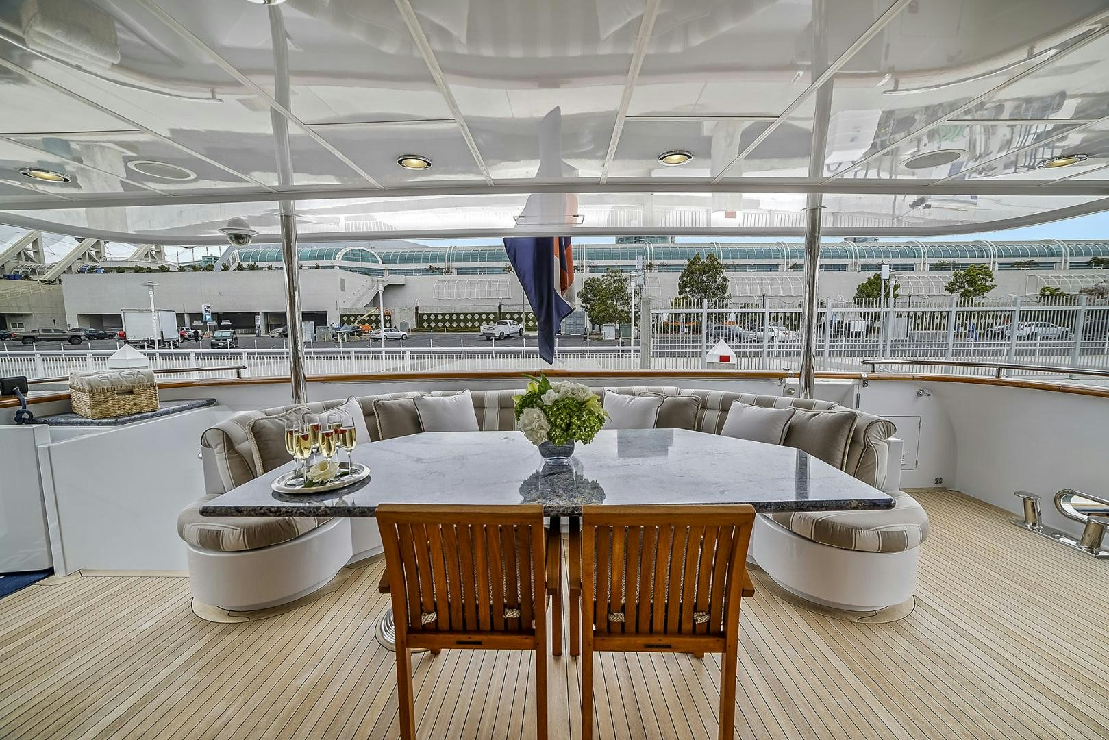 a large room with a table and chairs aboard ARTEMIS Yacht for Sale