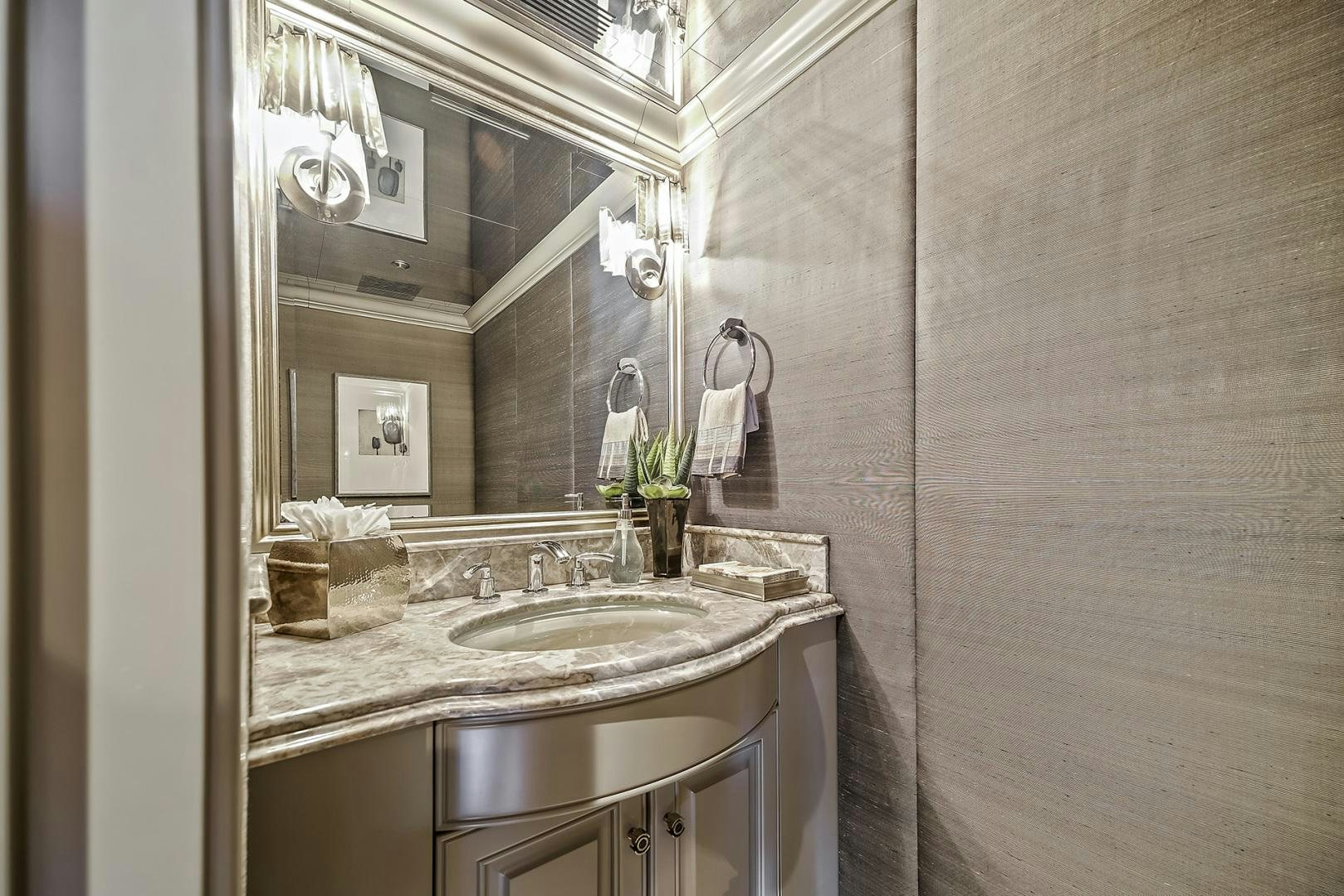 a bathroom with a large mirror aboard ARTEMIS Yacht for Sale