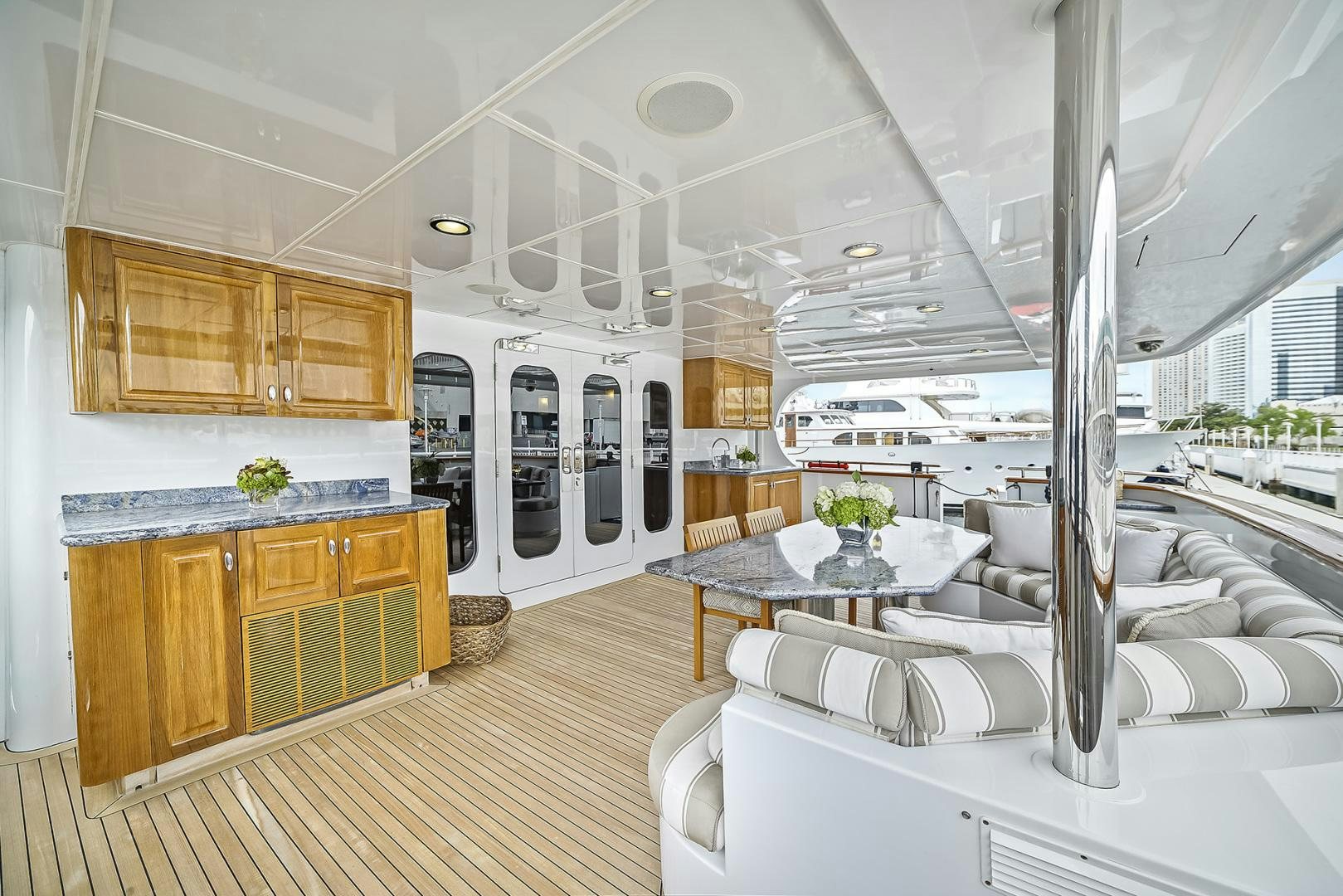 a large white kitchen with a large glass window aboard ARTEMIS Yacht for Sale