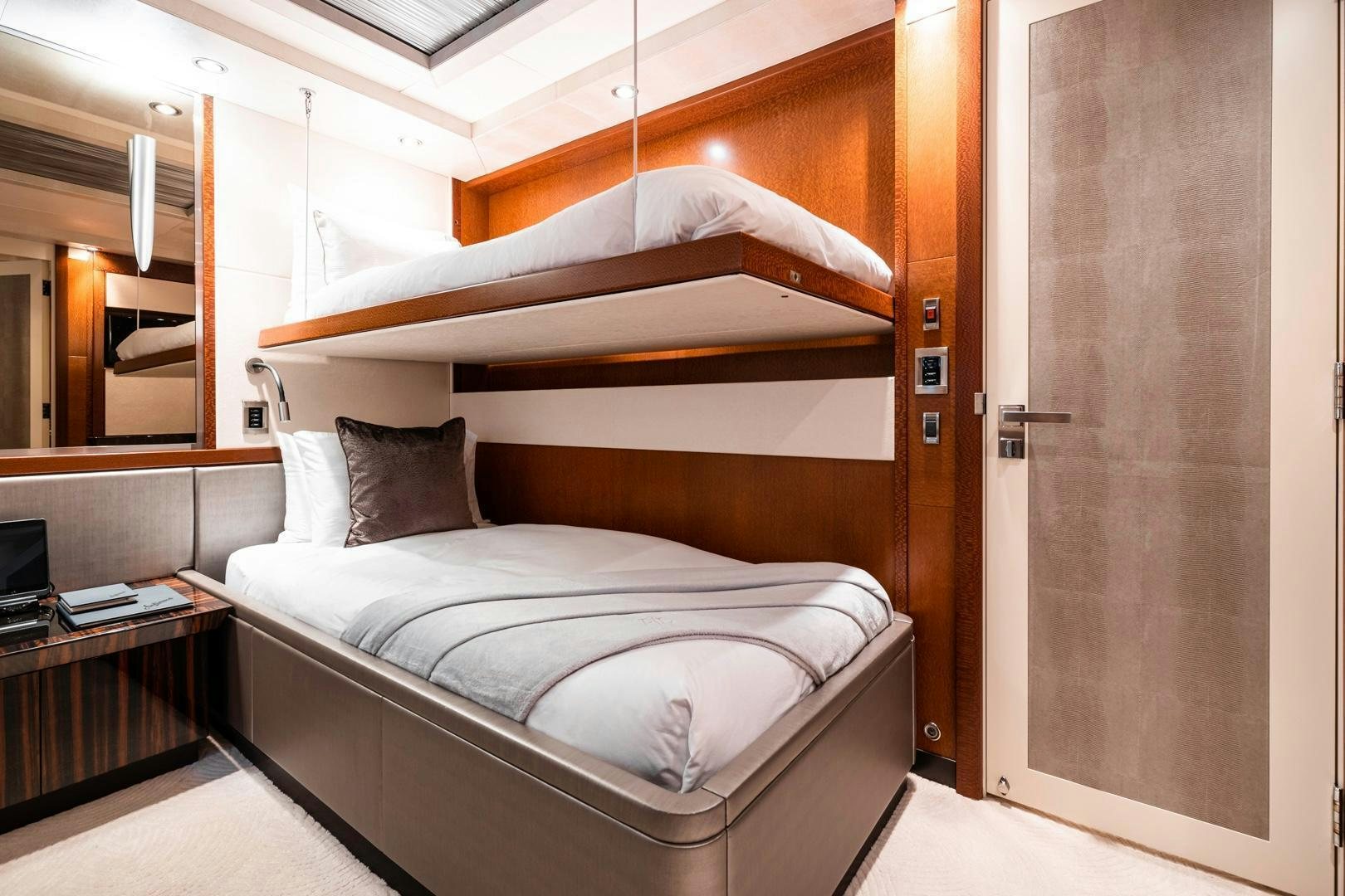 a bed in a room aboard AQUANOVA Yacht for Sale