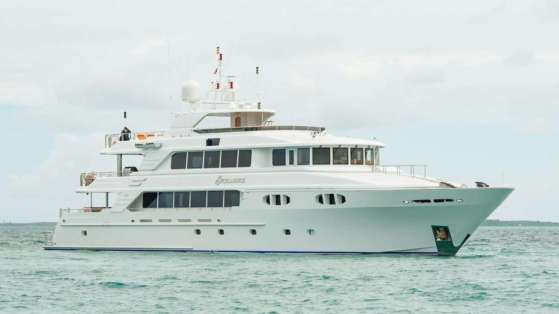 a large white boat in the water aboard EXCELLENCE Yacht for Sale