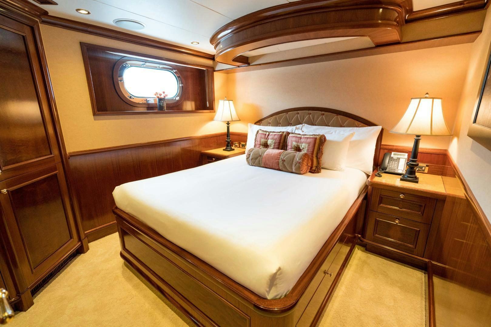 a hotel room with a bed aboard EXCELLENCE Yacht for Sale