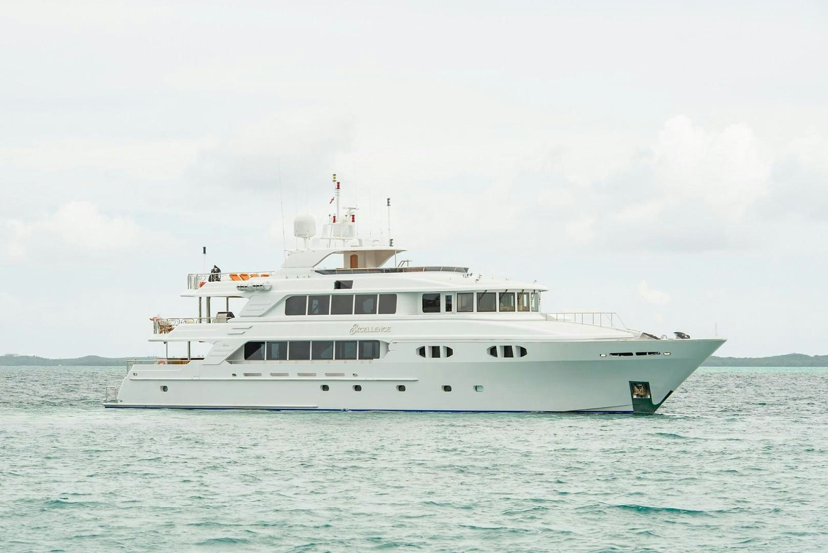 a large white boat in the water aboard EXCELLENCE Yacht for Sale