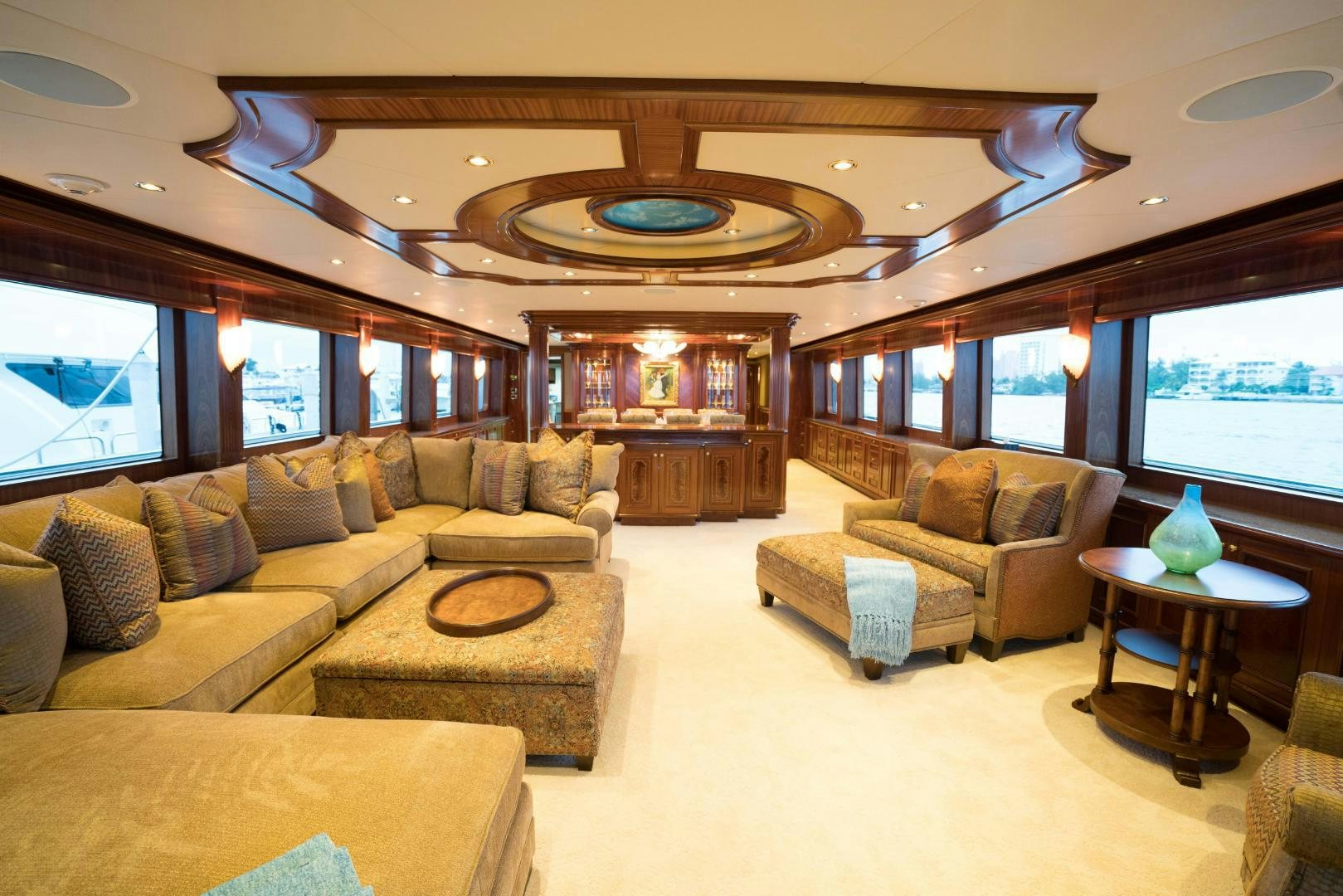 a living room with a large window aboard EXCELLENCE Yacht for Sale