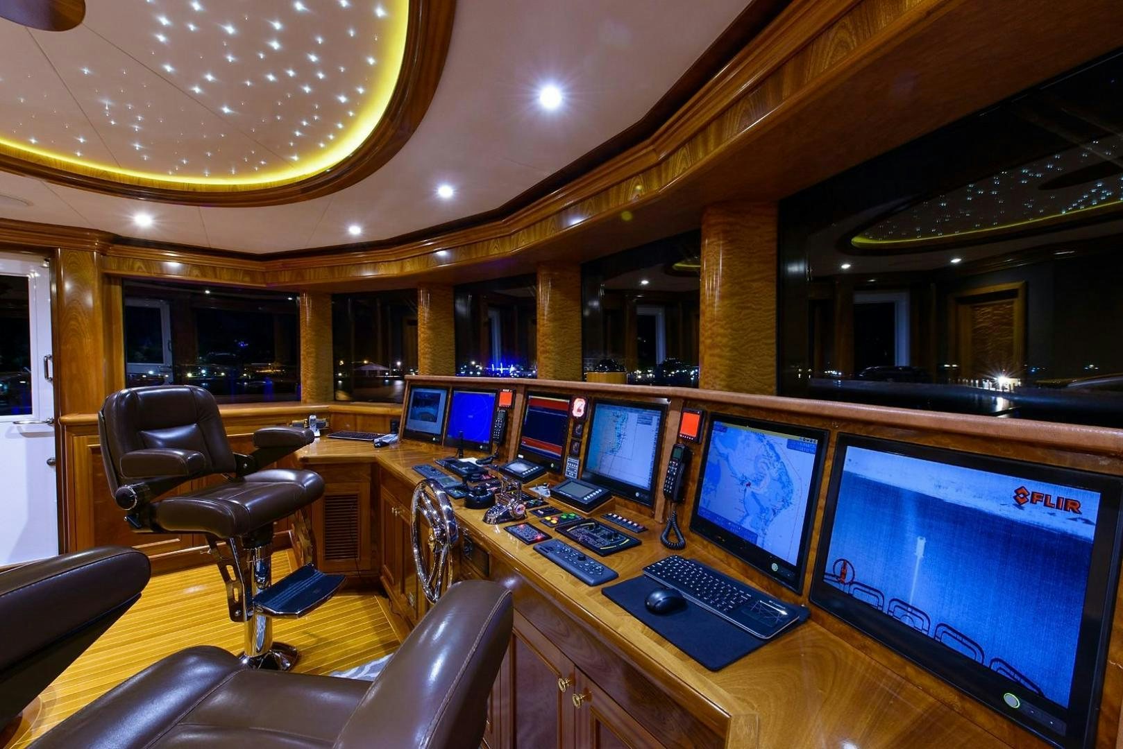 a room with many computers aboard EXCELLENCE Yacht for Sale