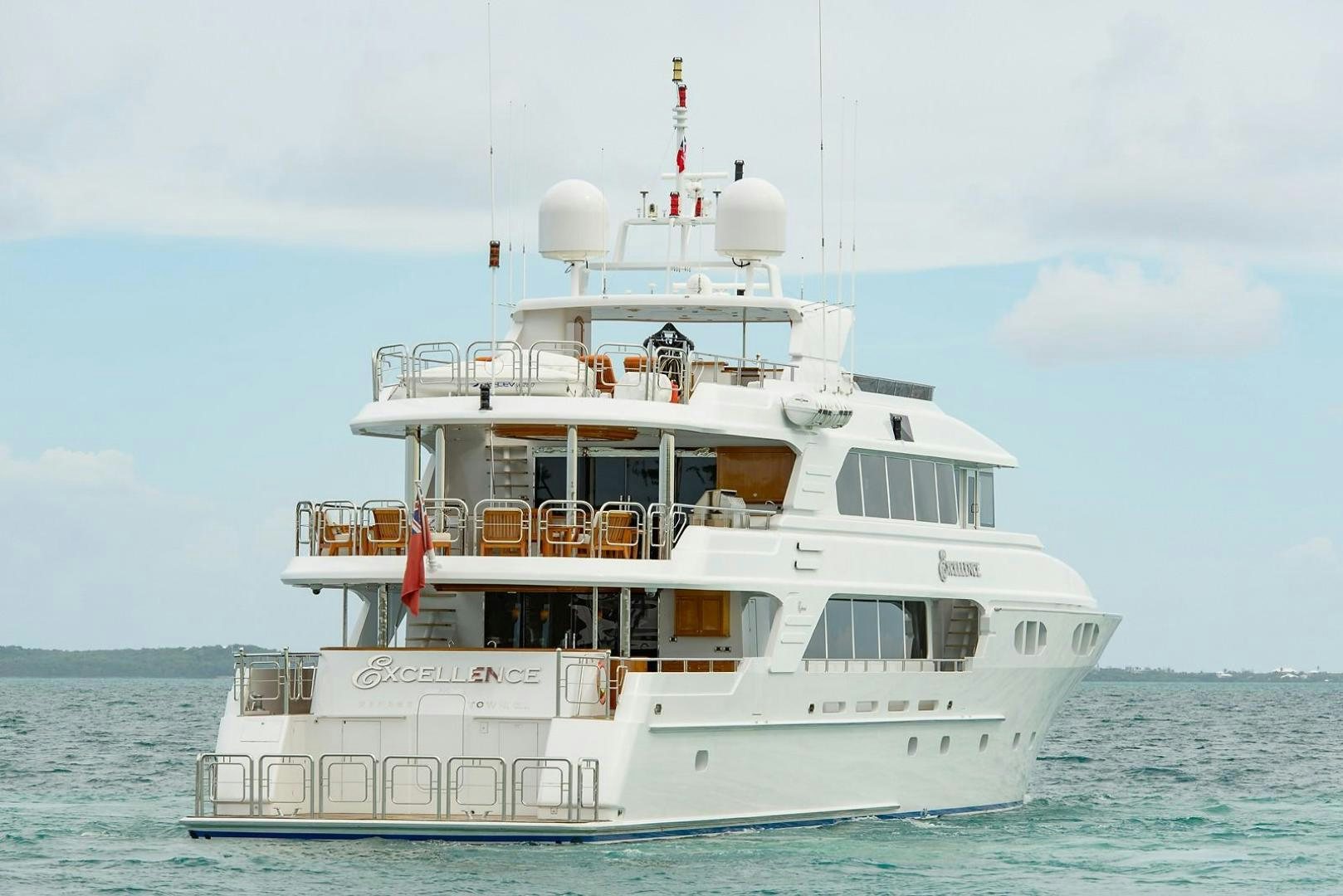 a white boat on the water aboard EXCELLENCE Yacht for Sale