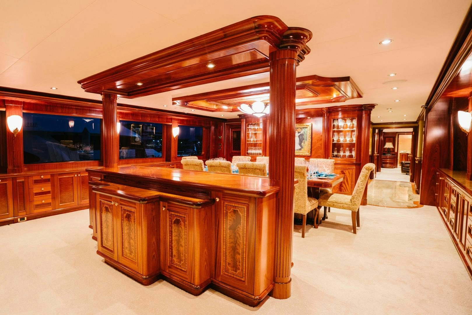 a wood desk in a room aboard EXCELLENCE Yacht for Sale