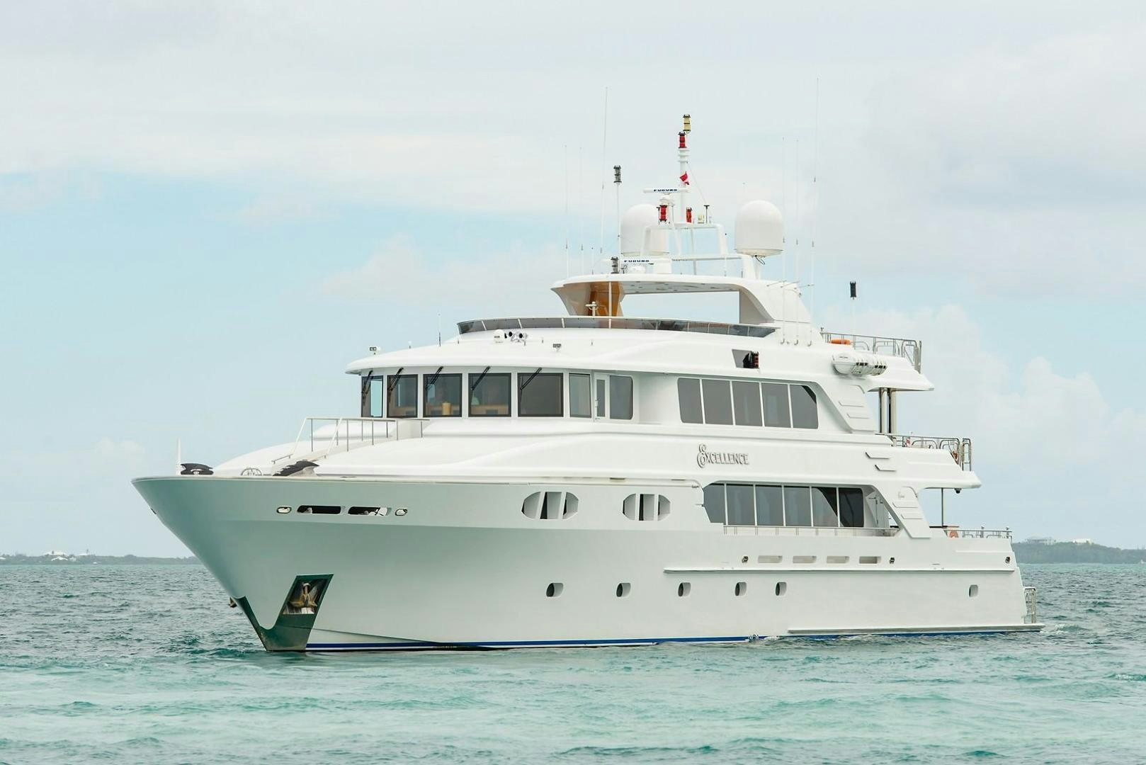 a white boat in the water aboard EXCELLENCE Yacht for Sale