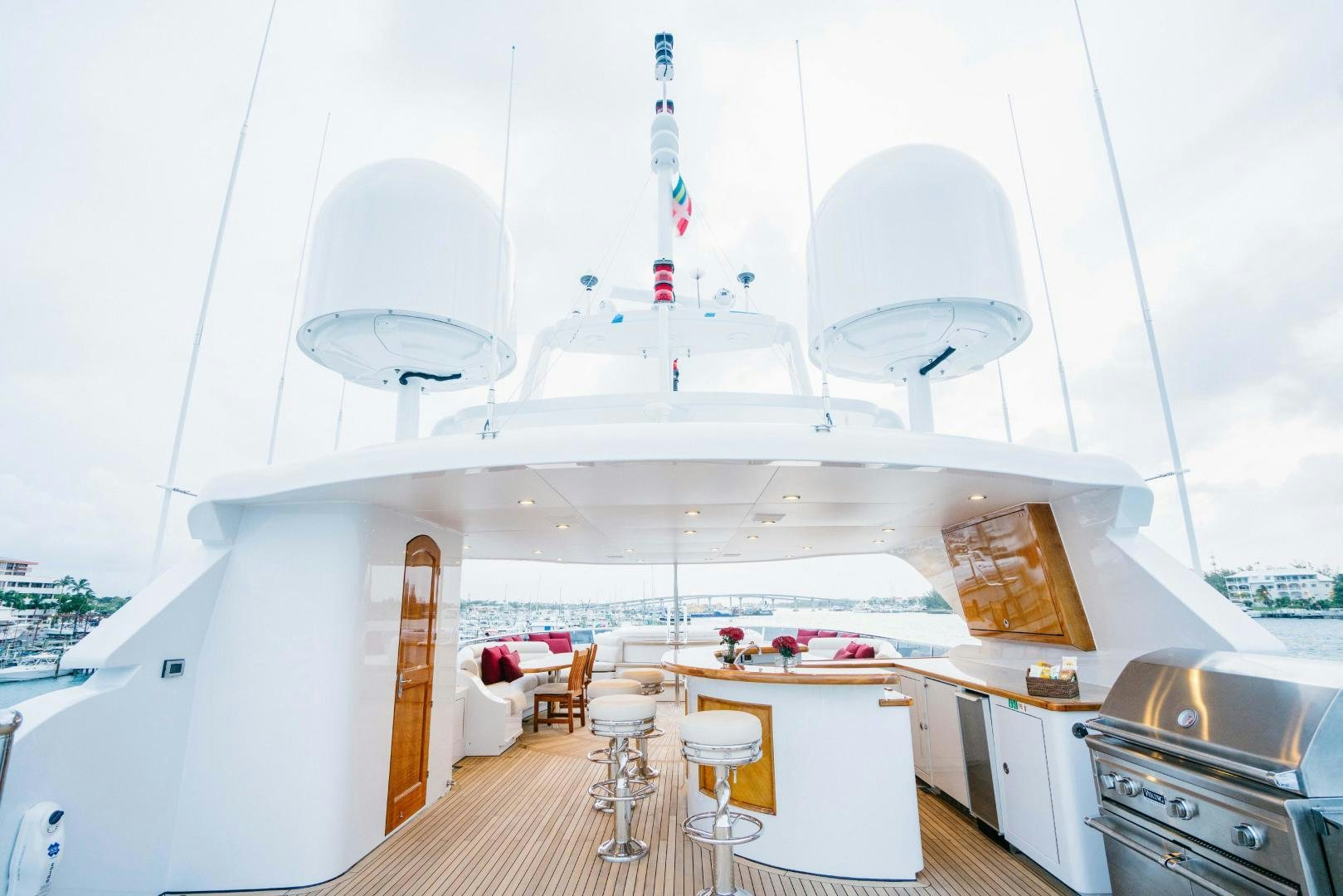 a room with a table and chairs aboard EXCELLENCE Yacht for Sale