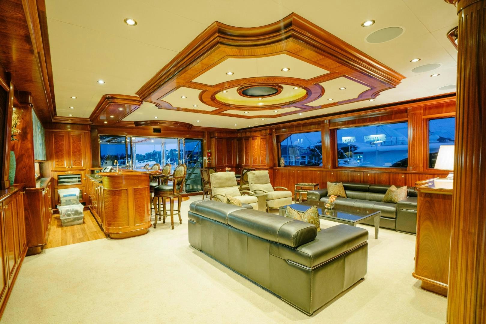 a large living room with a large open floor plan aboard EXCELLENCE Yacht for Sale
