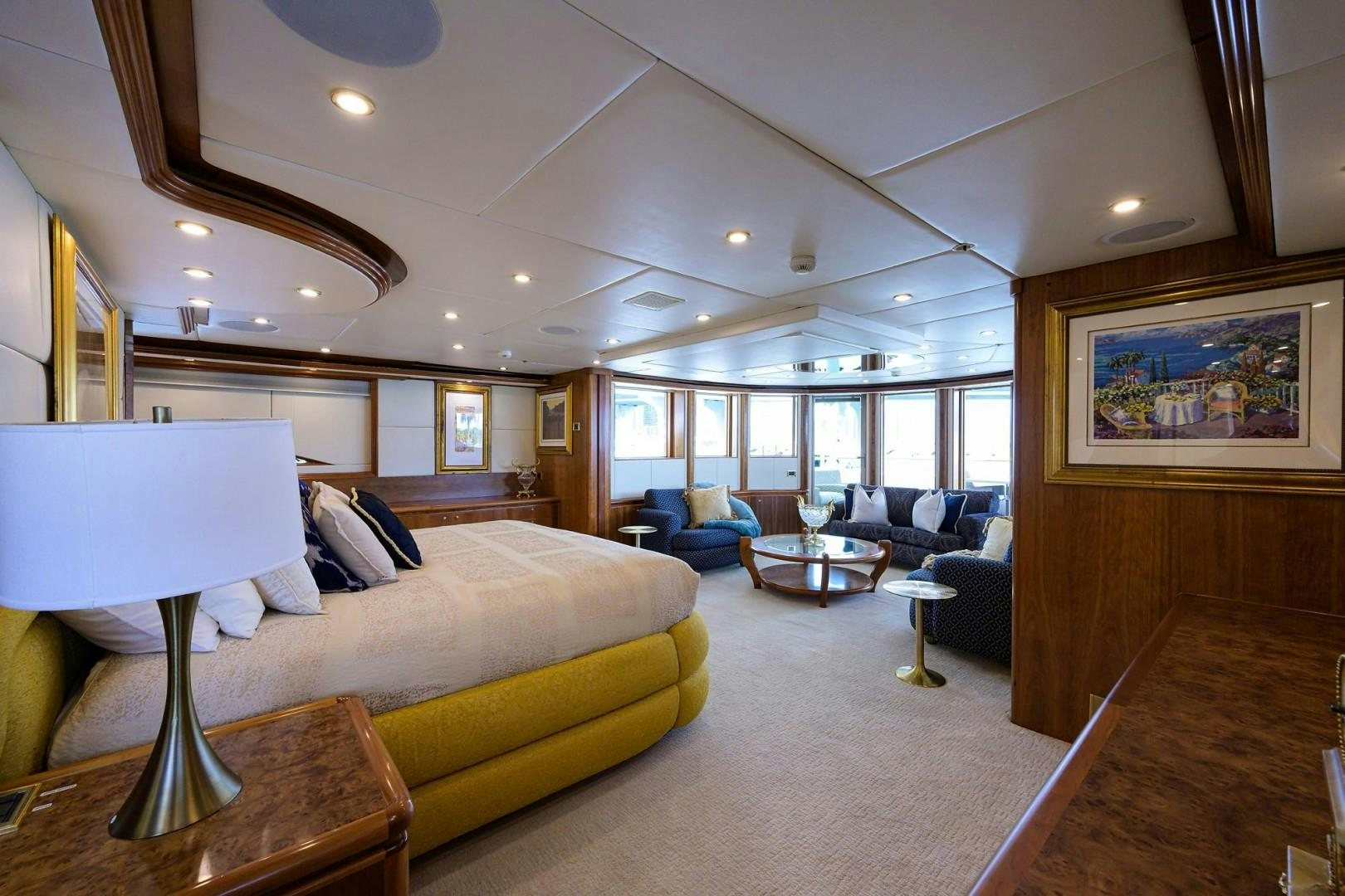 a living room with a large window aboard CABERNET Yacht for Sale