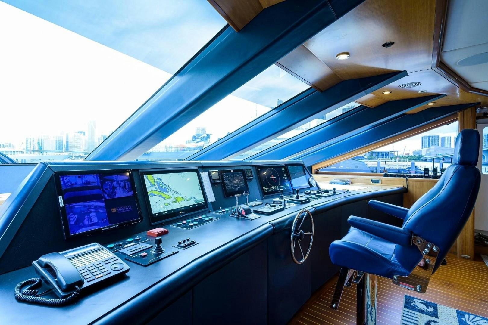 a plane with many monitors aboard CABERNET Yacht for Sale