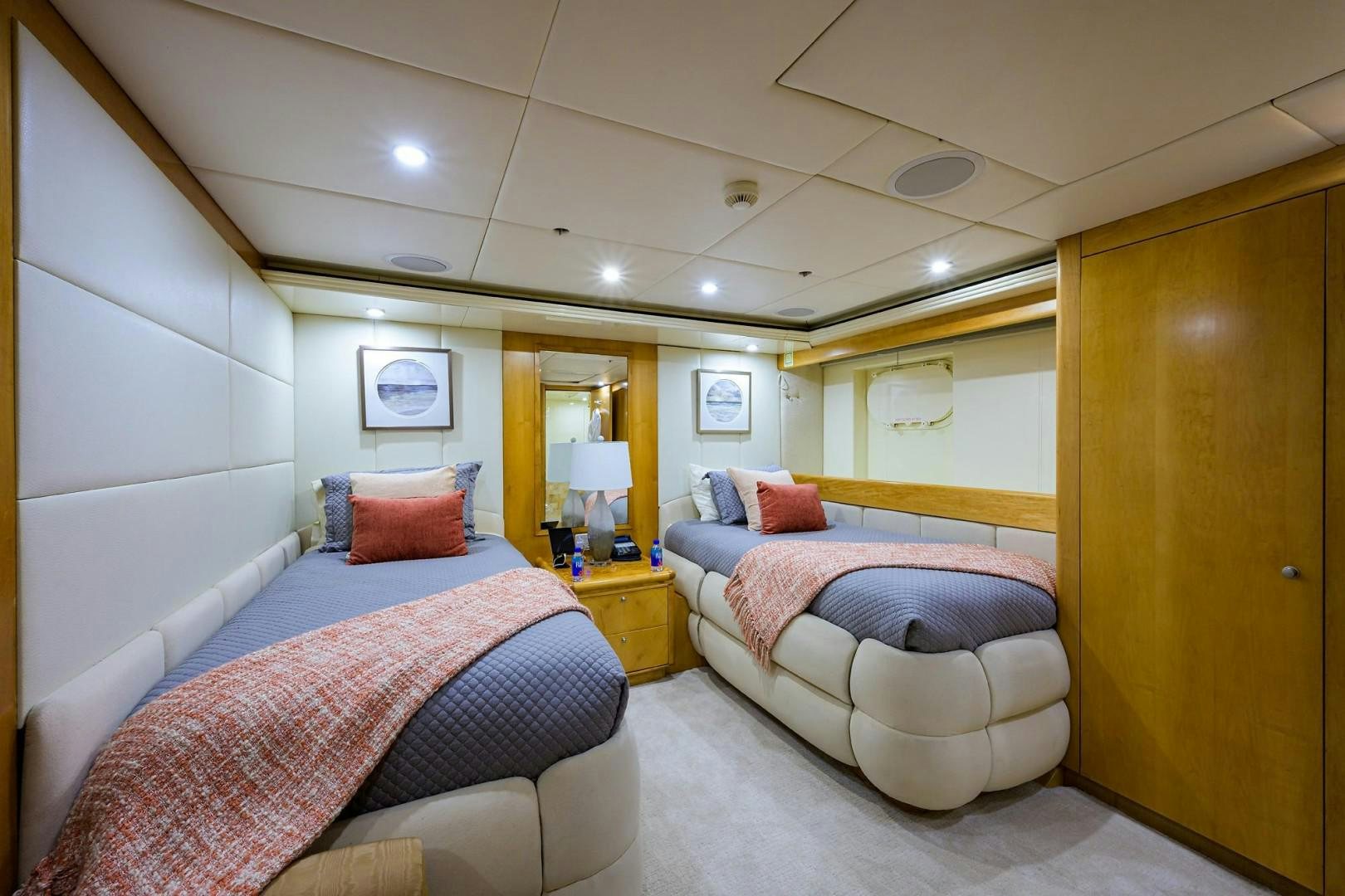 a couple of beds in a hotel room aboard CABERNET Yacht for Sale