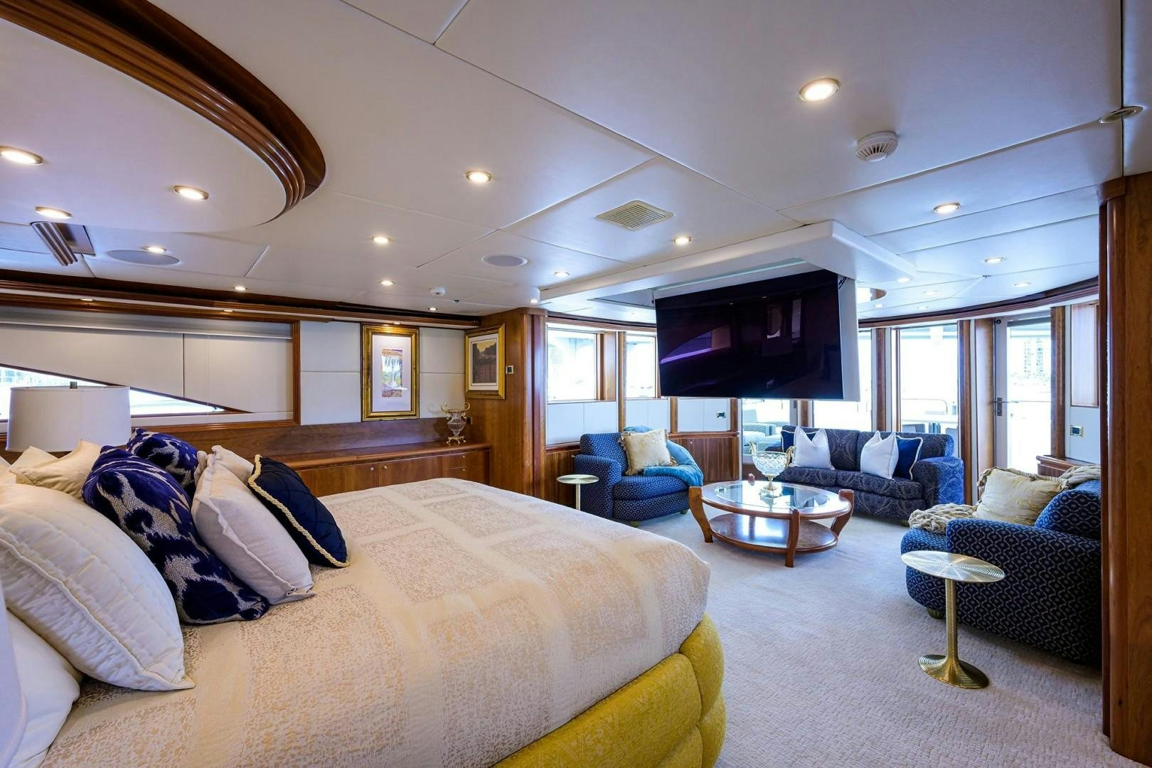 a large bedroom with a bed and a tv aboard CABERNET Yacht for Sale