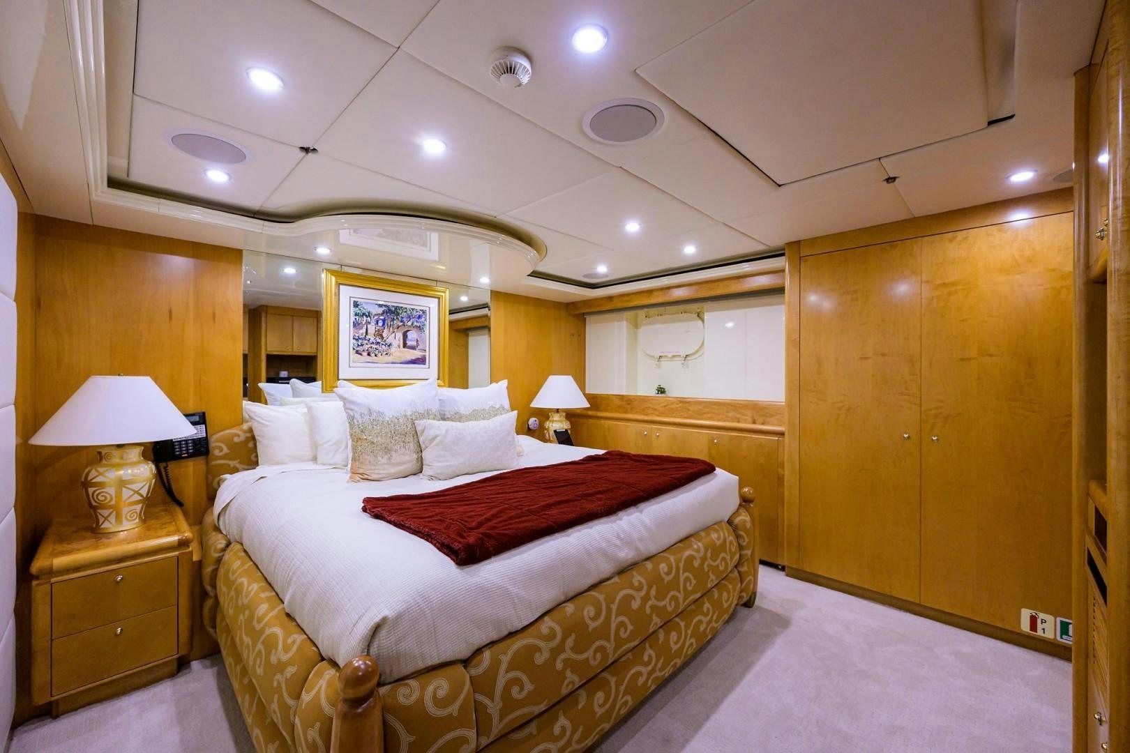 a large bed in a room aboard CABERNET Yacht for Sale