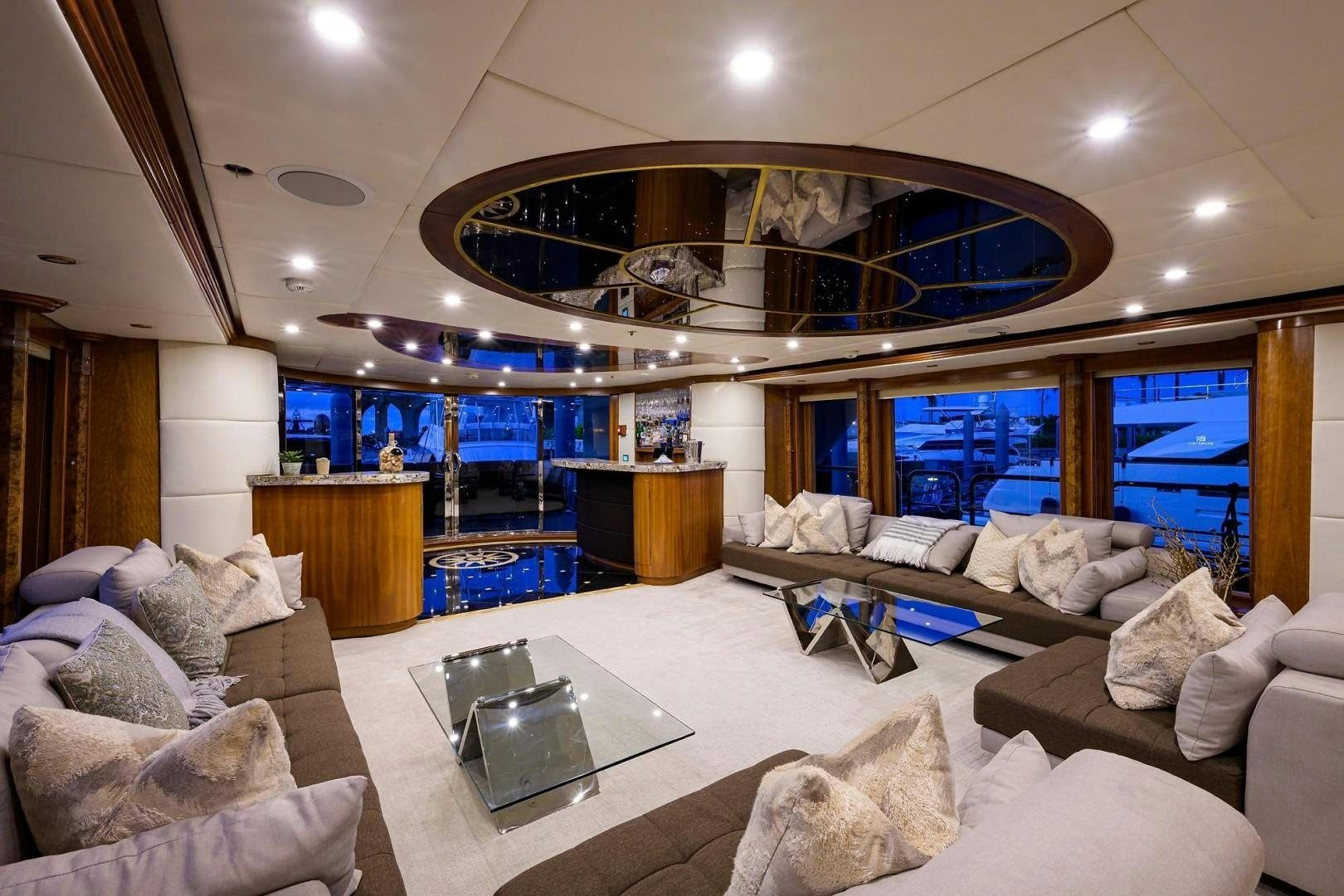 a living room with a large open window aboard CABERNET Yacht for Sale