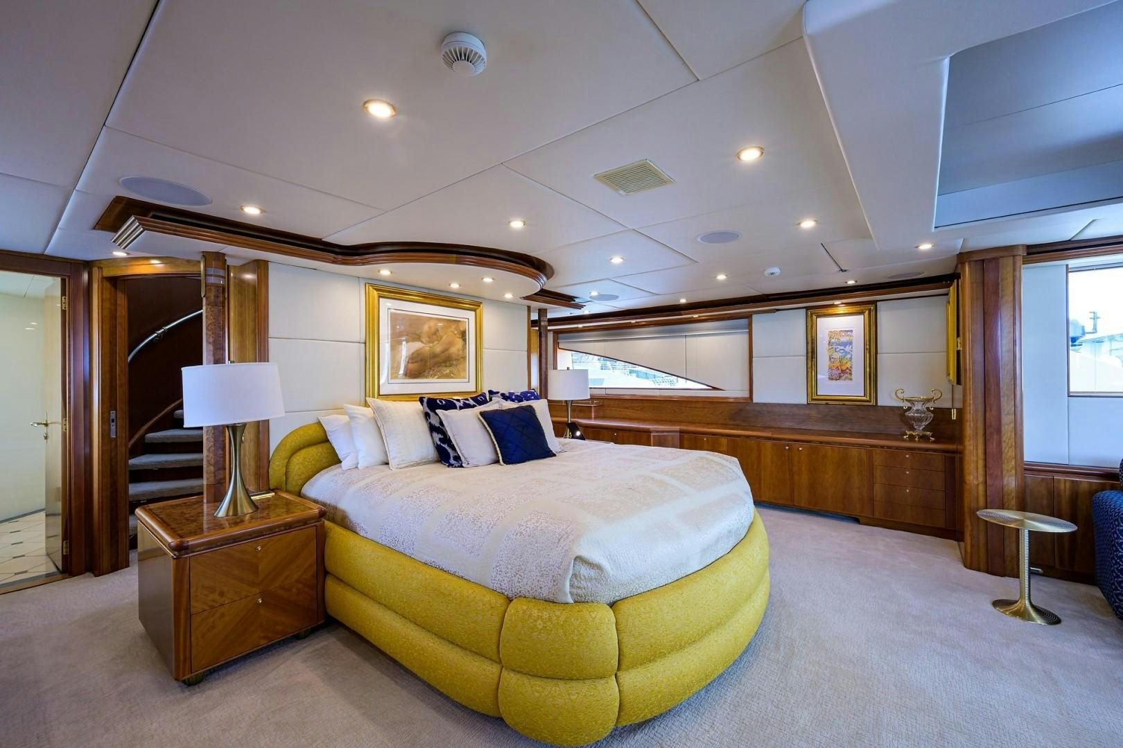a large bedroom with a large bed aboard CABERNET Yacht for Sale