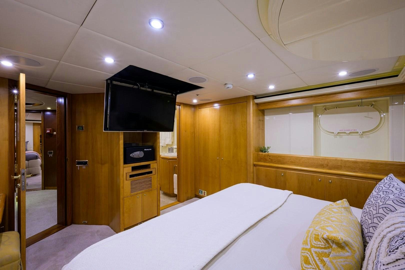a bed in a room aboard CABERNET Yacht for Sale
