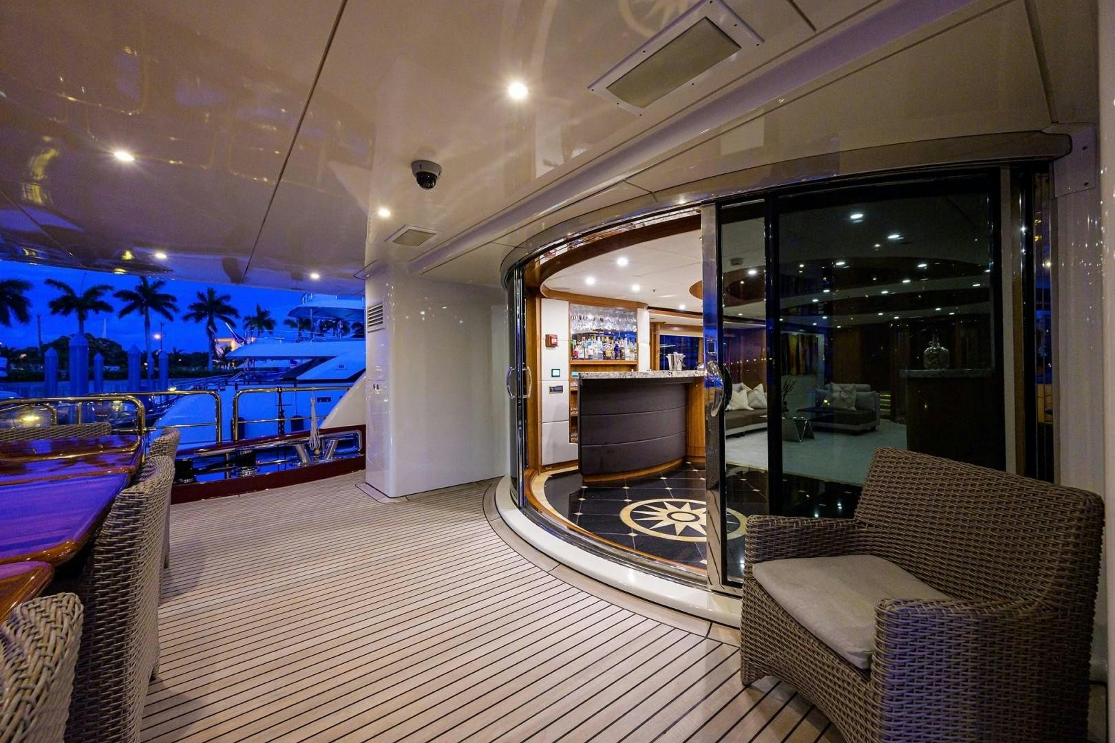 a room with a view of the water and the pool aboard CABERNET Yacht for Sale