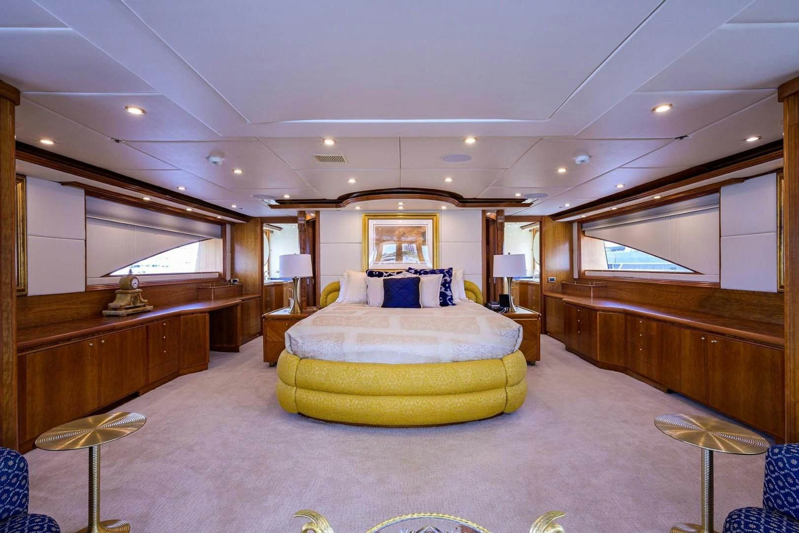 a large bedroom with a large bed aboard CABERNET Yacht for Sale