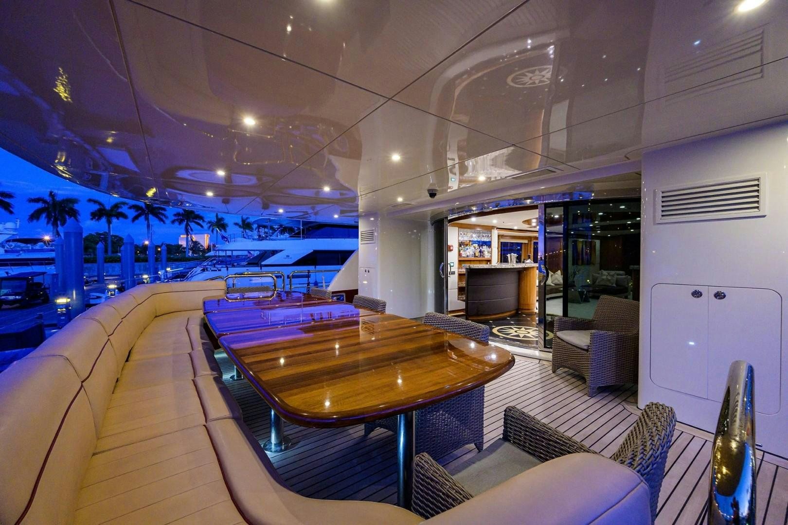 a room with a table and chairs aboard CABERNET Yacht for Sale