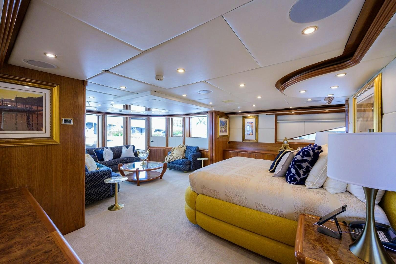 a living room with a couch and a table aboard CABERNET Yacht for Sale